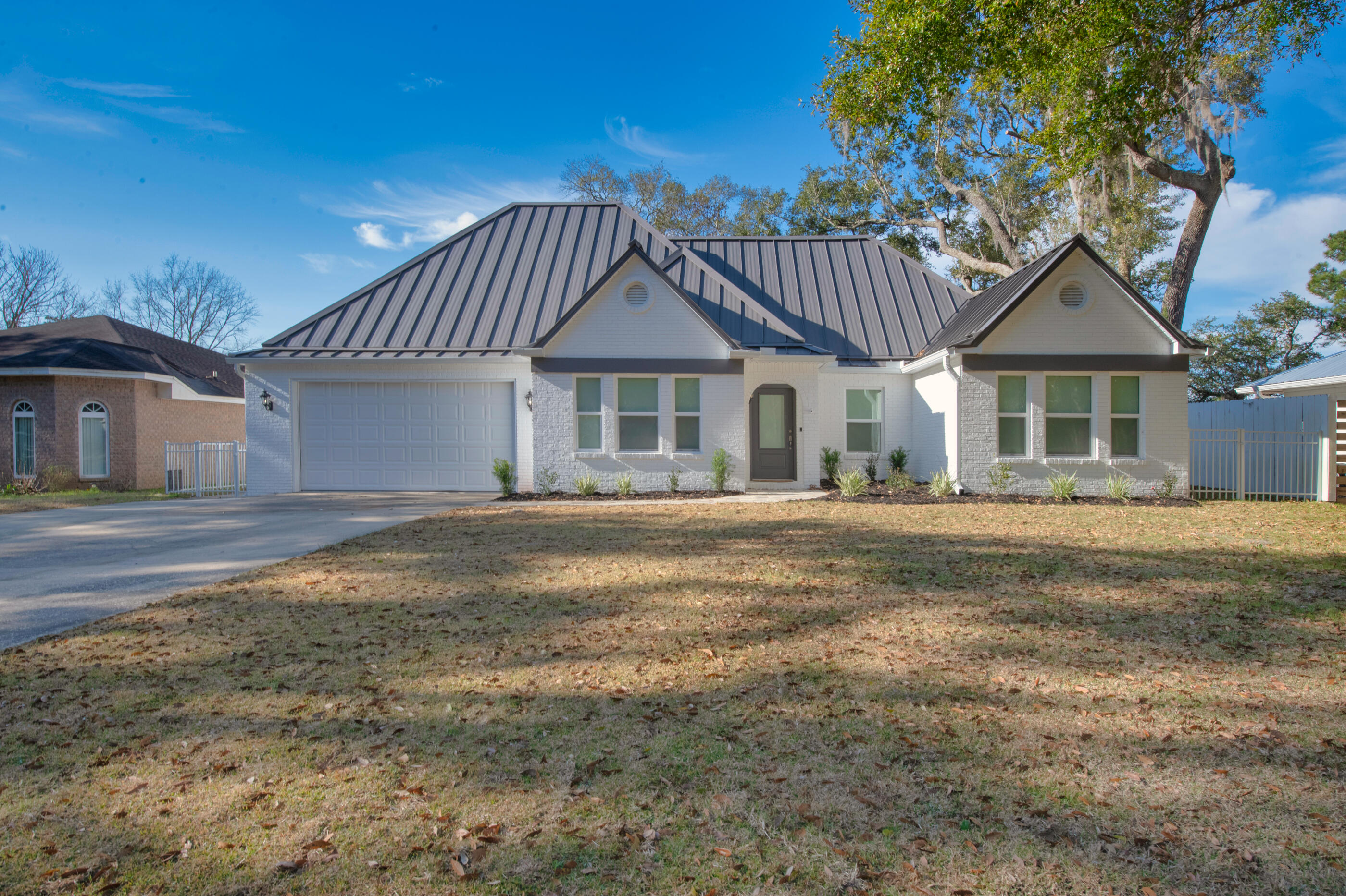 Waterfront living with indescribable sunsets overlooking out onto Alaqua Bayou and Choctawhatchee Bay. Watch the eagle soar and dolphin swimming in the bayou. Totally renovated in 2021, 3 bedrooms, office and bunk area with 3 full baths sits on 75' of Alaqua Bayou. Walk thru the front door and you are greeted with 5/8 walnut wood, scrapped Vintage color flooring throughout the home except tile in all bathrooms. Tongue and groove treyed ceiling in the dining area and master bdrm. Full view windows look out onto the water from the living room, master bdrm and office/bedroom. Custom cabinetry throughout the home and calcite blue countertops in the kitchen with a beautiful deep, cast iron double sink. Stainless steel appliances, induction cooktop and ice machine with plenty of storage tides hitting the shore; continue your walk through the fenced in back yard and onto the dock and platform. The covered boat slip is approximately 26' x 10' with a 5000 to 6000 lift. All new decking with ThruFlow panels. Waterview Cove has covenants and restrictions but no HOA at this time. Buyer(s) are responsible to personally verify all details for property and dimensions. Any information contained in this listing is believed to be accurate but is not guaranteed.