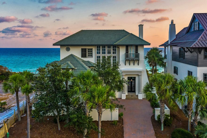 This Gulf-front home in the exclusive, gated neighborhood of The Retreat welcomes you in with unparalleled beauty and luxury. The ground-level entrance leads upstairs to a great room with an elevated, modern feel. A gorgeous dining area, complete with a stylish chandelier; divides the living room, complete with fireplace, from the striking kitchen.The great room gives way through a series of French doors to a generous porch with paver floor that overlooks the beach and Gulf of Mexico. Enjoy the stunning Gulf views while sunbathing or dining al fresco.