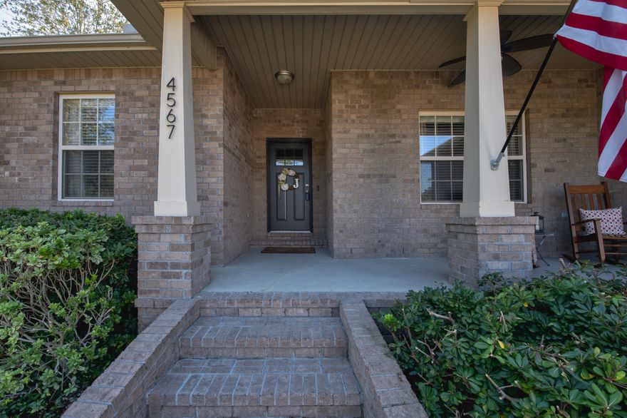 Don't miss this IMMACULATE home SOUTH of I 10. You will LOVE this home! This all brick home is MOVE IN READY, featuring 4 bedrooms in a great neighborhood with a view of Meadow Lake from the front porch. This brick home has an open floor plan, split bedrooms, 9' ceilings, 5 1/2' baseboards, granite, upgraded lighting, tile floors and more! The great room is a fantastic space which is open to the kitchen. The kitchen has plenty of counter space, glass tile backsplash, upgraded stainless appliances like a french door fridge, double oven and a large breakfast bar. The master bed/bath is a true retreat and enough space for all your furniture plus double vanities a large shower and garden tub. Don't miss the patio out back where you can relax and enjoy your back yard. Home warranty too!