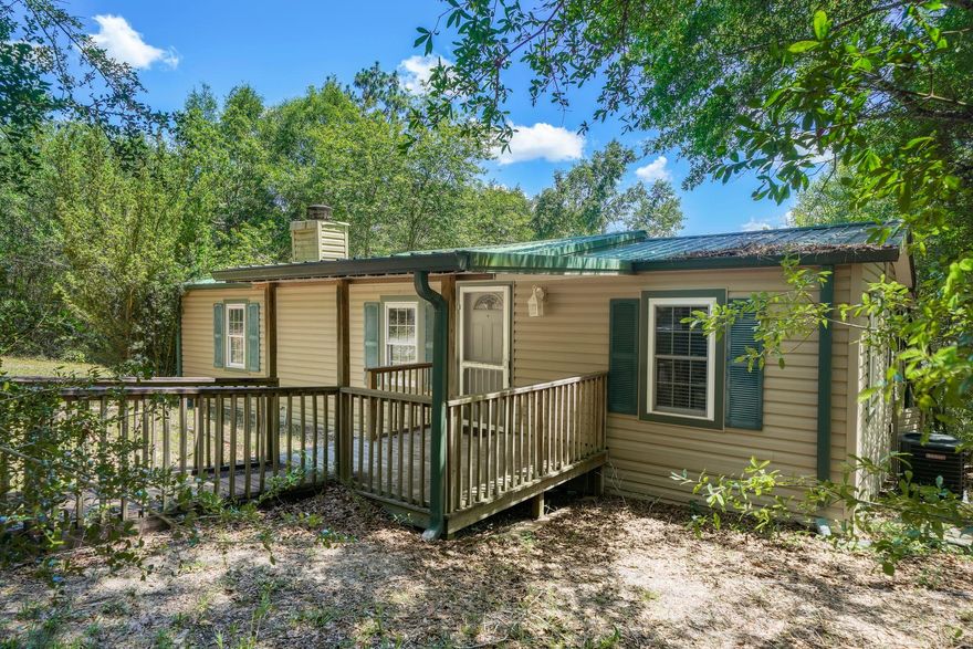 BEAUTIFUL WATER FRONT PROPERTY! This 3/2 home would be perfect for an investment property or a starter home. Property is perfectly located for wanting privacy, but also the convenience of town with just a few minute drive.