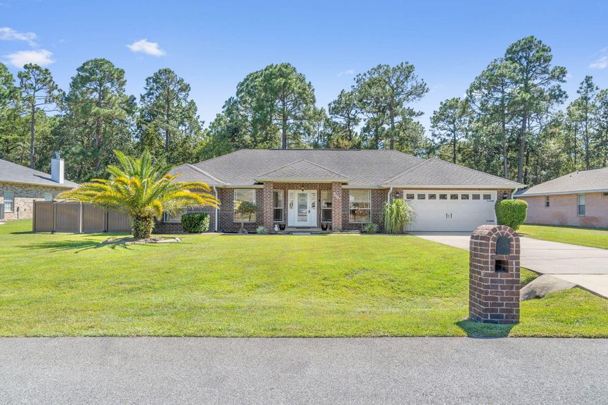 Simply Said....Welcome Home ~If you're looking for move in ready ~Here it is, this wonderful family home offers a sought-after location just a short drive from the beach, local stores, schools & Hurlburt Field AFB. Great family living space~your 3 bed/2 bath home is fully fenced with a large South facing back yard ~ large screened in patio area ~and brick workshop - perfect outdoor living space to entertain or just enjoy those wonderful Florida evenings. Home is located on a cul-de-sac offering pleasing curb appeal with manicured landscaping and a welcoming covered front porch. Entering the home,you will appreciate the open flow to the family room with vaulted ceiling and focal point fireplace~Kitchen has wrap around breakfast bar, lots of cabinet & countertop space, pantry, under cabinet lighting, custom slide out spice rack, wine fridge and offers access through to the family dining room. Cozy breakfast nook for your "on the go days "overlooks the back garden and screen porch. Master bedroom has lots of space with a trey ceiling and a door out to the patio area. Master bath offers a step-in tub and separate shower~ Two walk in closets that are fitted with cabinets, drawers and staggered hanging rods.  Additional bedrooms are a good size and share the 2nd bathroom with vanity sink and step in tub/shower. All this and the home still offers an entry foyer with access to the light and bright den/office room. Indoor laundry has cabinets and hanging rod and leads out to the double garage with poxy floor covering and drop down attic stairs.
Yard has a vinyl fence and double gates which enclose the lots grassed area, great all brick workshop and vegetable garden. The lot extends past the fenced area and provides a large wooded buffer for privacy.
Home has wooden storm panels and a transferable termite bond. 
Living in Holley By The Sea owners Enjoy all the amenities including: Pools, Fully Equipped Gym, Tennis Courts, Waterfront Park & Deeded Access to Santa Rosa Sound.
Call today to view your little piece of paradise.


