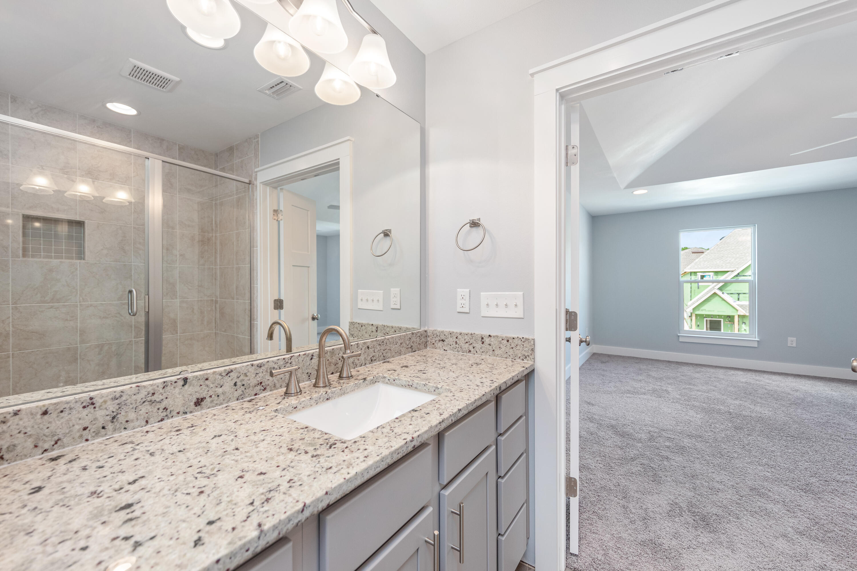 New townhome in Tuscan Village, ready to move right in! The home features an open concept living space that is open to the kitchen. White granite counters and grey cabinets make the kitchen shine with stainless appliances and breakfast bar. Wood look laminate throughout. Large master suite on the second floor and two guest bedrooms and a convenient located laundry room. One car garage. Centrally located close to restaurants, shopping and sandy white beaches. Construction complete, ready for you to move right in. All information is believed to be correct, but, buyer should verify any and all information deemed important to them. No SHORT TERM Rentals.
