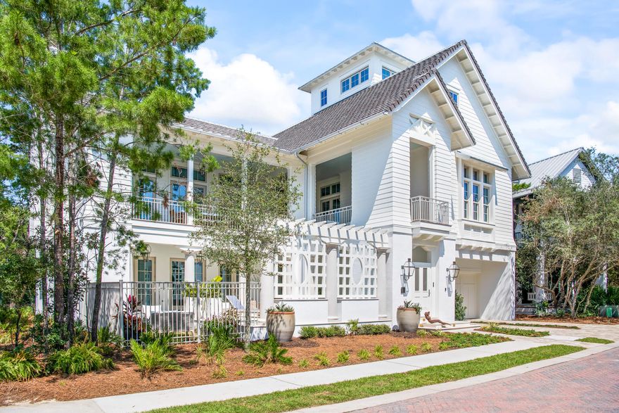 Introducing 'The Heritage' -The VIE Legacy Show Home  exemplifying the best of luxury living on 30A with gulf views in the rental restricted gated beachfront neighborhood of Heritage Dunes.  Step into exquisitely furnished 76 N. Heritage Dunes Lane and experience this timeless Southern coastal home designed by Gerald Burwell of Burwell & Associates and expertly constructed by Grand Bay Construction. The indoor and outdoor spaces are intentionally designed for timeless comfort, selecting the finest materials and appointments for their enjoyment, appeal and durability.  Interior Designer Duce May creates an unrivaled sense of beachside life by incorporating Ralph Lauren Modern Collection furnishings, accessories and art you would expect from a VIE Legacy Show Home. Signature features of the home include light filled rooms with high ceilings, hardwood floors, an elevator, EF San Juan custom windows and doors, special lighting, security, sound system, and curated designer furnishings.  Each level provides ample space for family and guests to gather, making the home an ideal place for entertaining.
Entering the foyer, the ground level features two bedrooms with en suite baths for guests, a powder room, and a large, welcoming entertainment room with direct access to the outdoor poolside veranda.
The main second floor living area includes a spacious kitchen, dining and living room with soaring ash beamed ceiling, anchored by a striking coquina fireplace with custom mantel.  French doors to the surrounding veranda extend the generous living space outside. The gourmet kitchen with adjoining butler's pantry features side-by-side Sub Zero refrigeration, 48-inch dual fuel 6-burner with infrared griddle Wolf range, and Cove dishwasher. The Master Bedroom Suite features a wine and coffee bar, dual customized closets, a spa like bath, and also opens to the wrap around veranda featuring Bevolo gas lanterns.   On the third level, two additional bedrooms share a seating room, while the fourth floor Tower/Sky Bar Room features window-filled Euro-Walls providing extraordinary neighborhood and gulf views, which can be opened to enjoy a perfect beach breeze or closed to enjoy the comfort and convenience of the climate-controlled space.  
Outside, landscape architect Patrick Hodges brings the pool scape, outdoor gardens and verandas to life, seamlessly incorporating the grounds with the surrounding natural environment.  The southern exposure pool crowned with a pergola and colonnade is fed by water emanating from two separate walls creating a soothing resonance of falling water. 
We invite you to discover 76 N. Heritage Dunes by scheduling an appointment to personally experience this wonderfully designed and constructed residence.   
