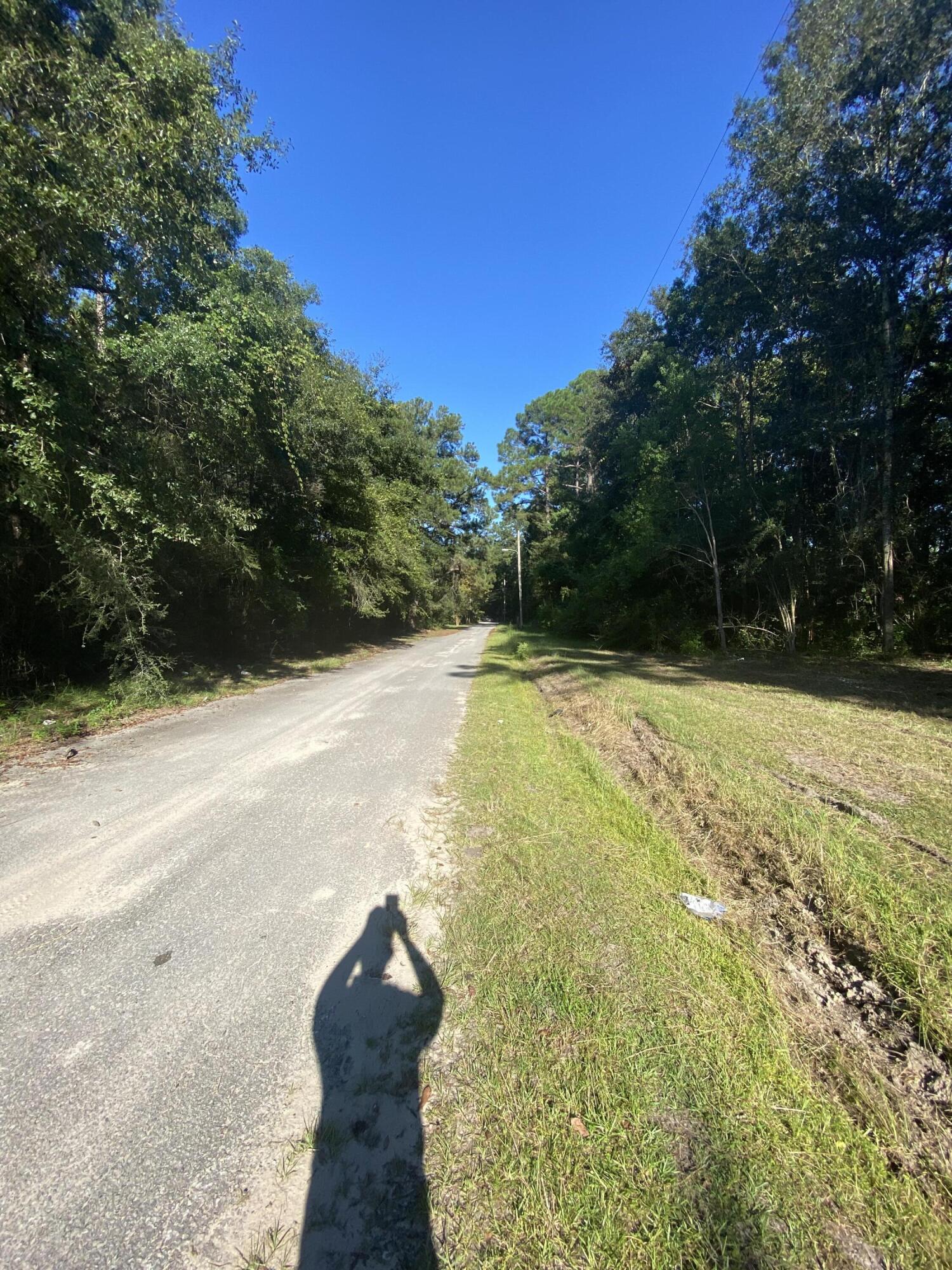 NO HOA SO NO RESTRICTIONS! SELLER MOTIVATED BRING OFFER! BUILD YOUR DREAM HOME OR HOMES FOR FAMILY COMPOUND. BUILDERS TAKE A LOOK! Plenty of space on this primarily cleared 2 Acre Parcel. Zoned Vacant Residential could potentially build 3 homes. Mature Pines, Oaks and various other trees add to the landscape. No Association and in the Heart of Downtown Defuniak Springs.Go look today! Buyer and Buyers Agent to verify All Dimensions and anything deemed important.