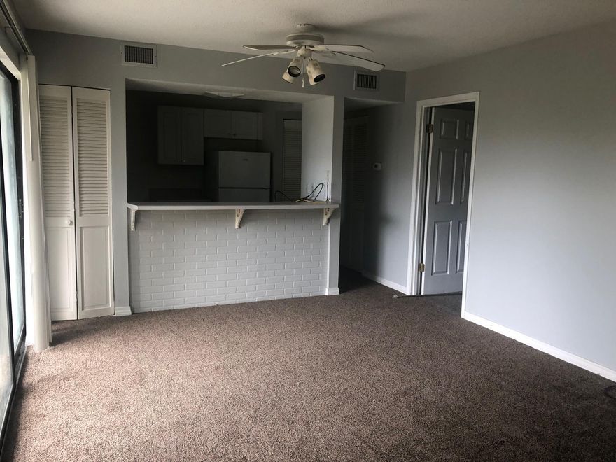 Vacant one bedroom with a private patio, first floor, easy access. New carpet, newer kitchen. freshly painted, great rental unit for vacation or long term. Centrally located, close to the Beach, Restaurants, Shopping & Entertainment. Amenities include: 3 pools, tennis, laundry facility, outdoor grills, community room. Buyer to verify all dimensions