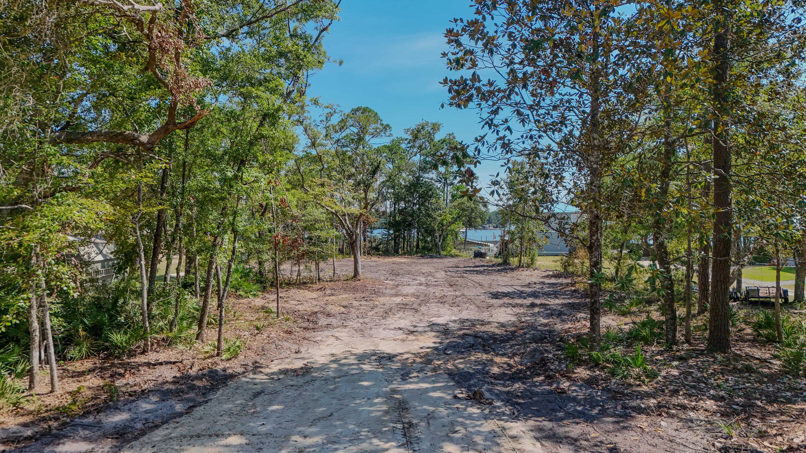 Welcome to Lagrange Shores, where a rare opportunity awaits to build your dream home on over one acre of waterfront property. This 1.3+/- acre bayou-front lot includes approximately .72 acres of uplands and offers a serene setting surrounded by the natural beauty of towering oaks and scenic bay waters. With no HOA, you'll have the freedom to design a home and lifestyle that truly fit your vision.The property is ideally situated near Freeport's new middle school and the Freeport Regional Sports Complex, offering convenience alongside its peaceful surroundings. Just minutes away are Publix, shopping, and dining options, as well as the world-famous white sand beaches and vibrant communities of South Walton and 30A.Boaters will appreciate direct access to Choctawhatchee Bay , the new Shipyard Marina, and the Intracoastal Waterway, with scenic routes to Destin Pass or Panama City. While the location provides a quiet retreat away from crowds and traffic, it remains close to everything Freeport has to offer.
As the area continues to grow, waterfront homes in this neighborhood have sold for over $1 million, making this an excellent long-term investment. A survey, home plan, doc permit, wetlands study are already complete, making it easier to move forward with your plans. Don't miss this chance to create your own waterfront haven in one of Freeport's most desirable locations.