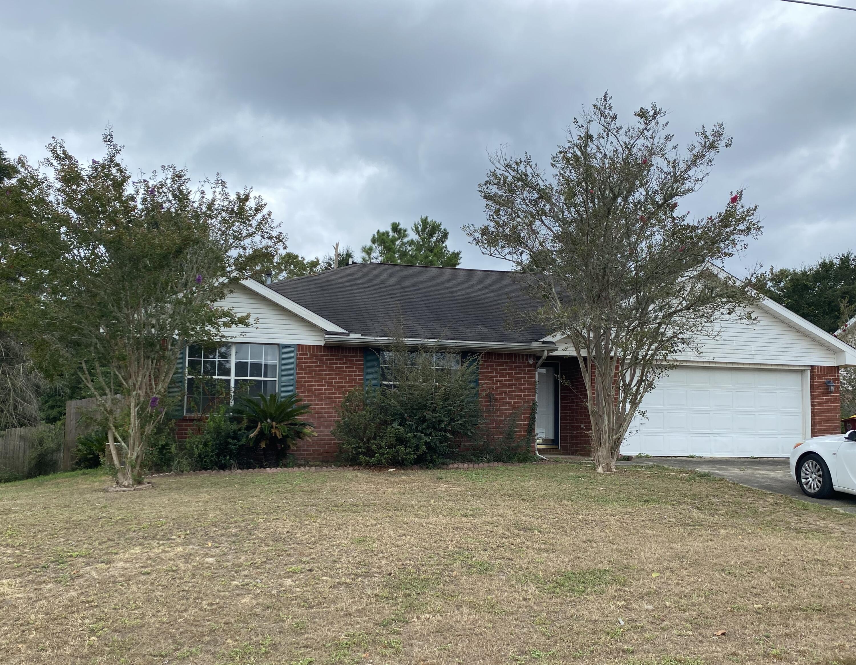 South of the Interstate.  This 3 bedroom 2 bath home is waiting for you.  Easy commute to the local Military Bases.  Cathedral ceiling and a cozy wood burning fireplace is the first thing you will notice upon entering the home.  Eat in kitchen.  Utility room just off the kitchen which includes washer and dryer.  Nice size Large bedroom has plenty of room for your large furniture and a walk in closet.