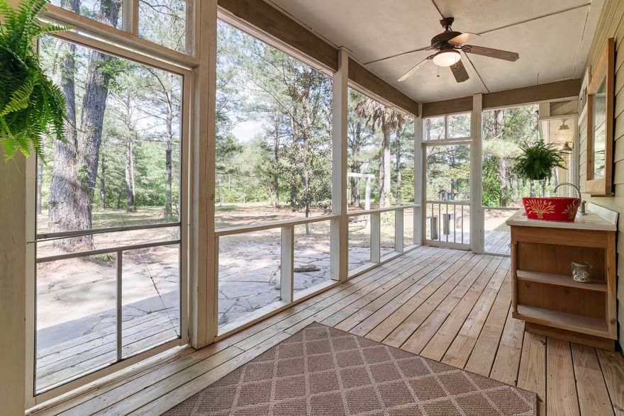 SELLER IS OFFERING $15,000 IN FLEXIABLE INCENTIVES-APPLY TOWARD CLOSING COSTS, A RATE BUY-DOWN, OR HOME UPGRADES.  A FANTASTIC OPPORTUNITY FOR BUYERS TO PERSONALIZE THIS HOME AND MAKE IT THEIR OWN. Set on 27.45 acres of stunning land, this property offers the ultimate in peace, privacy, and country living. Zoned agricultural, this property allows horses or livestock and features nearly 50 blueberry bushes plus assorted fruit trees for a serene retreat.  The charming home feels straight out of a storybook, while practical features make this property ideal for modern living.A large enclosed pole barn includes an air-conditioned office and covered storage for equipment and supplies. A separate fully air-conditioned office building offers versatility for professionals or entrepreneurs, complete with additional covered storage.
Additional amenities include a chicken coop and more, providing comfort, convenience, and lifestyle. More than just a home, this property is a complete retreat with endless possibilities for living, working, and enjoying the outdoors.

