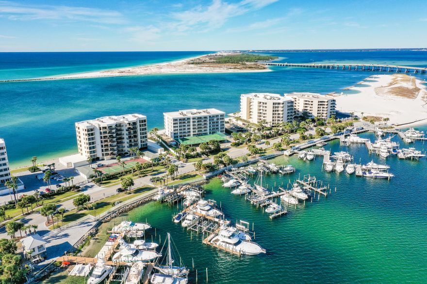 Waterview Towers Yacht Club is one of Destin's Most exclusive and private waterfront properties with panoramic views of the water. This unit is Sold Fully Furnished with upgrades galore. A must see condo with a unique floor-plan that has TWO gulf/pass front en suite's with stunning views. A separate bunk room, wet bar, island, shiplap walls, modern kitchen, granite countertops and backsplash are just a few of the unique details. Waterview Towers presents an amazing lifestyle for a full or part time resident with the serene and peaceful vibe. Breathtaking views from one of the two balconies lets you watch a sunset, fireworks or simply kick back and enjoy the the harbor or Gulf pass views of the water, marine life and or fleets of boats passing you by. Private covered parking space included.