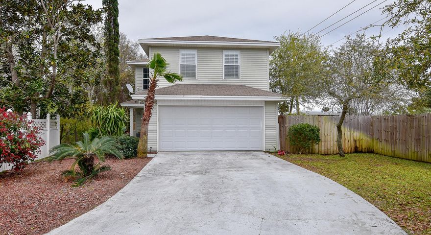 PRICE REDUCTION!!! What can't you say about this gorgeous home? As you go inside the fenced area, the first thing you will notice is the HUGE lot, perfect for pets, kids, or boat/RV storage. The backyard is something out of a magazine with lakefront views, a large bricked patio, and raised garden beds. This outdoor living space is the perfect place for entertaining or relaxing and watching the sunrise with your coffee.
Through the front door, you will enter the foyer which
leads to the downstairs open layout living area, dining area, and updated kitchen. A hallway located near the foyer will lead upstairs to all four bedrooms. Home has new A/C unit replaced in 2018. This is a must see house, that will not last long--your Destin Oasis is here!