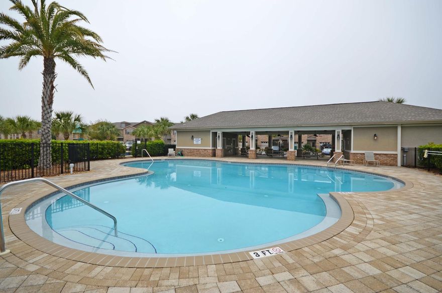 Location, Location, Location!!! What a great way to live, just a mile from the Navarre Beach Bridge, on Elks Way, directly behind the Shrimp Basket - 3BR/2.5BA Townhome; Situated within the community of Reserve Pointe and centrally located in Navarre and minutes from beaches and Hurlburt. This incredible home displays ALL of the standard features PLUS $5,000 in ADDITIONAL UPGRADES! This unit is all you could want and more! Downstairs is open and spacious with new Brazilian Koa laminate WOOD FLOORING and TILE, and trimmed out with 5 1/4 base molding. Window treatments; Kitchen offers recessed-panel MAPLE CABINETRY, black GE appliances and GRANITE counters. Half-bath can be found on the 1st floor and also has a GRANITE counter. Upstairs has even more space and living area with two bedrooms