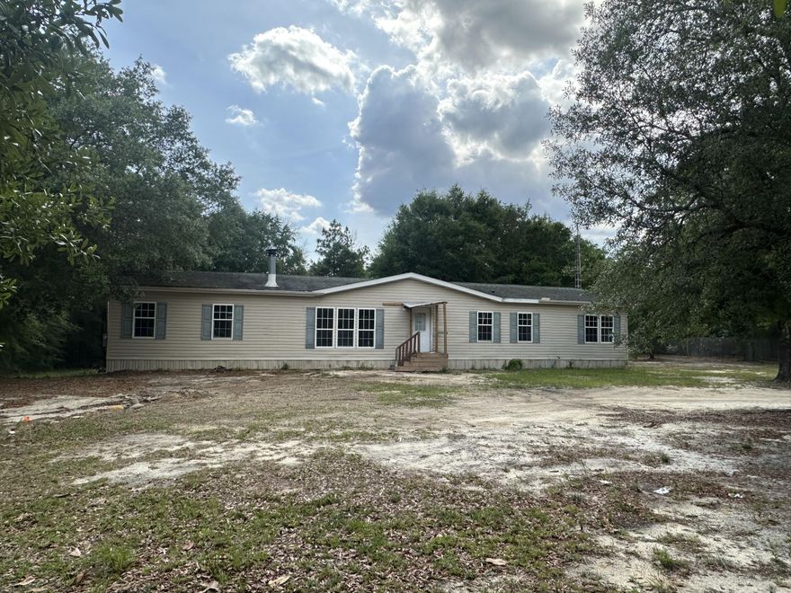 Fixer upper! With easy access to major highways like Hwy 90, Hwy 393, Hwy 85, Hwy 2, and I-10, the entire region is at your fingertips. Imagine the convenience of being just a short drive from both the Okaloosa Industrial Park and the breathtaking natural beauty of the Shoal River Ranch and nearby beaches. What's more, this property is zoned as agricultural, allowing you the freedom to explore a wide range of potential uses. Don't miss out on the chance to make this your perfect oasis. Buyer to verify measurments and details. As-is .