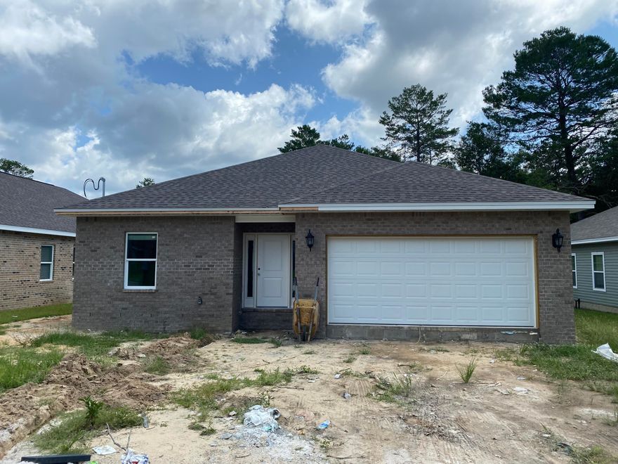 New construction located conveniently to all that Niceville has to offer! 4 bedrooms, 3 full baths with a powder room AND an office! Open concept, vinyl plank flooring throughout, spacious fenced yard and ALL brick! This home is a gem and comes with a one year builder warranty.