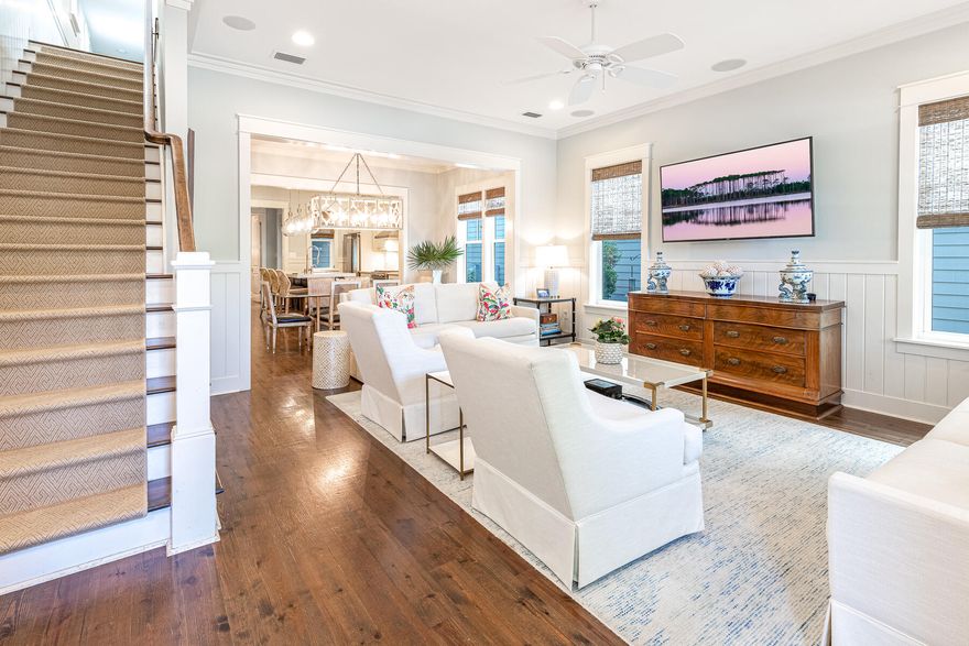 This beautiful 5 bedroom, 4.5 bath home in Watercolor Resort will make a great vacation home or investment property with rental projections over $135,000. This home features hardwood floors throughout, V-Groove wood walls, 10ft ceilings on the first floor, abundant windows, recently updated kitchen with Quartz countertops, Viking appliances, bar area with wine fridge & gorgeous light fixtures throughout. The home has 2 generous Primary suites, one on the first floor and one on the second with private porch, a second floor media area with vaulted ceilings, and 2 additional large bedrooms and the 5th bedroom is a bunk room with full size bunk on the bottom. This home has plenty of storage, with large pantry, closets & a golf cart garage.