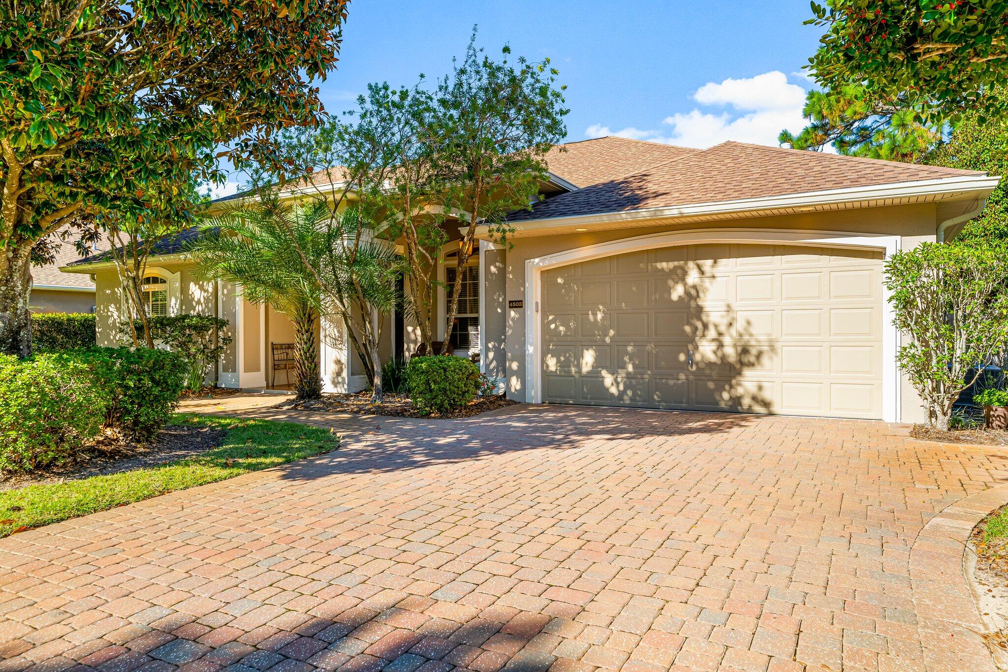 Welcome to Chardonnay Estates! This meticulously maintained home, featuring a newer roof, is ready for you to move in and start enjoying immediately. With a paver driveway, sidewalks, and patio, the property offers both beauty and functionality. As you step through the elegant double entry doors, you are greeted by a spacious and inviting living area. The open floor plan includes a formal dining room, a well-appointed kitchen with an eat-in area and snack bar, and a convenient walk-through butler's pantry. The double-sided gas fireplace adds warmth and charm, creating a cozy atmosphere perfect for family gatherings or entertaining guests. The oversized sliding glass doors lead to a screened-in back porch that opens onto a beautifully landscaped paver patio. Here, you'll find a built-in fire pit ideal for entertaining or simply relaxing on a serene Florida evening. This home boasts 3 bedrooms and 2.5 bathrooms, offering plenty of space for comfort and privacy. Additionally, you'll be within walking distance of Choctawhatchee Bay, where you can enjoy the beach, watch stunning sunsets, or try your hand at fishing. Don't miss out on this incredible opportunity - schedule your private tour today!