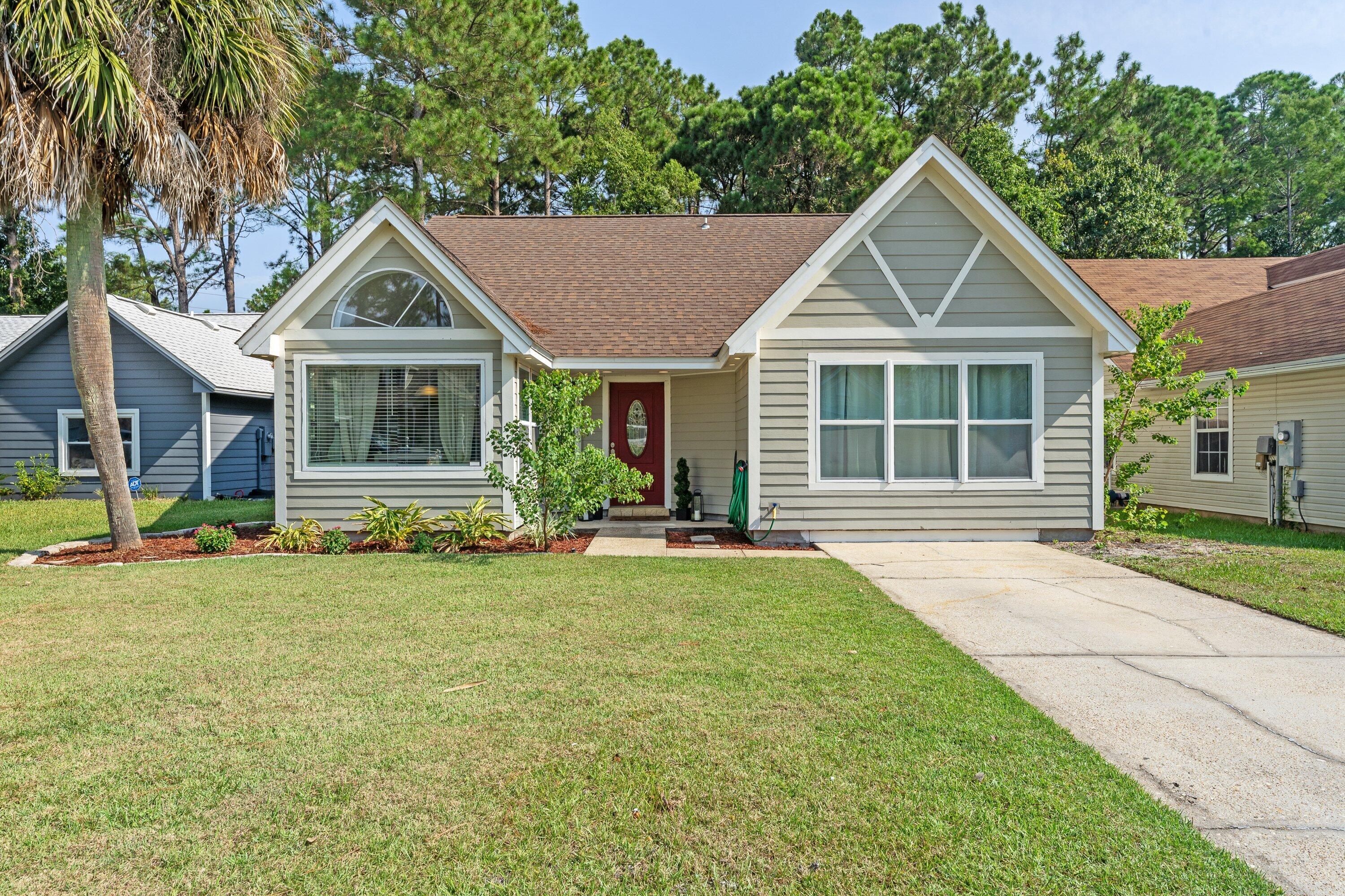 Welcome home to this charming three-bedroom, two-bath residence that welcomes you with open arms. Positioned ideally between Hurlburt and Eglin AFB, and a short drive away from our pristine sandy beaches, this home offers the perfect location. The heart of this home lies in the open connection between the kitchen, dining room, and living room. The Kitchen has beautiful quartz countertops, complemented by an abundance of natural lighting through the picture windows in the dining area, creating an inviting atmosphere.