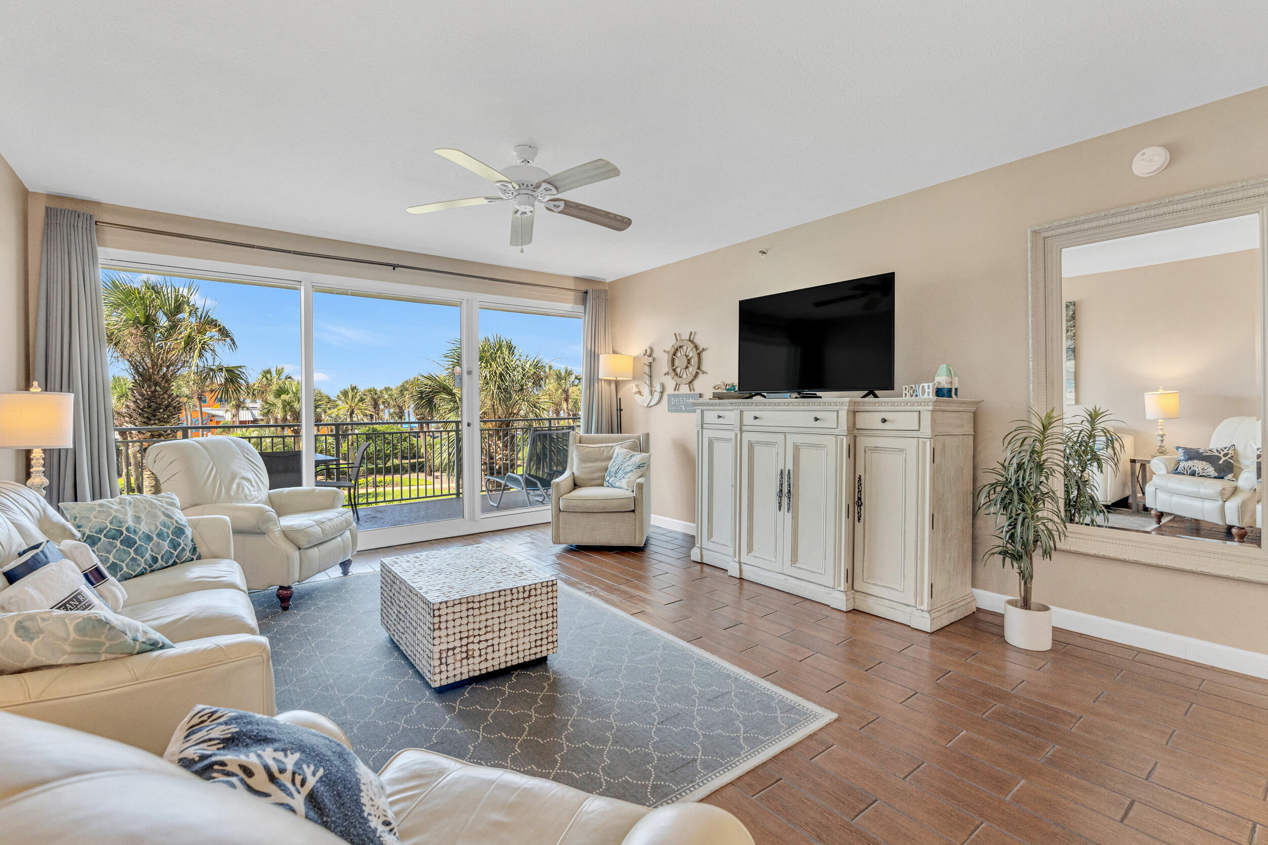 THE BIGGER 2 bed/2 ba condo in this building with Private OVERSIZED BALCONY and peekaboo view of the Gulf. This one is PRICED RIGHT! Being located on the second floor and close to stairway makes it very convenient. NO NEED TO WAIT FOR THE ELEVATOR ... just walk right down to your car, beach and pool. Cannot be better! The condo is very well decorated with the beach in mind. You actually have a peekaboo view of the water from your very private balcony. Some of the highlights: no carpet, no popcorn ceiling, full size washer/dryer, stainless steel appliances and granite countertop in kitchen, separate shower with jacuzzi tub in the primary bathroom, fully furnished - turnkey ready. Projected Income $40-$50K . Sterling Shores is a gated complex in the heart of Destin featuring 400' of private beach, a lagoon-style pool with mushroom spray fountain, sundecks, & a beachside pool with Tiki bar & grill. Other amenities at Sterling Shores include a fitness center and The Back Porch restaurant, one of Destin's most popular beachfront restaurants, is just steps away. Hurry to schedule a viewing. The price is right!