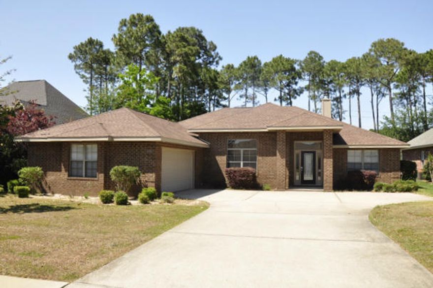 REO. ALL BRICK home situated in a wonderful, waterfront gated subdivision. As you step into the home, you are greeted with a large living room complete with a welcoming fireplace. Both sides of the fireplace feature built-in shelving, great for storage, decorating, or whatever else you may want. A separate dining area is located to the left of the entryway and provides direct access to both the living room and kitchen. Make your way into the kitchen that boasts a generous amount of dark cherry-wood cabinetry, stainless steel appliances, granite countertops, and a pantry... perfect for your kitchen storage needs! Thanks to the split bedroom floorplan, the master bedroom is located on one side of the home and the other three bedrooms are located on the other side.