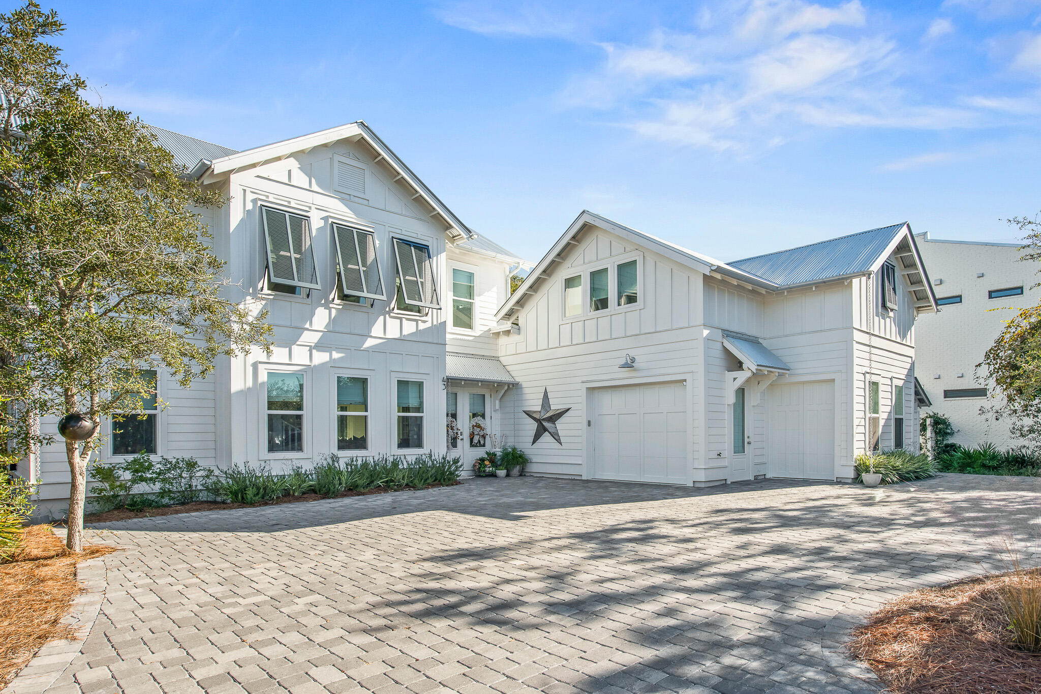 Welcome to 43 Suzanne Drive, ideally located in the heart of Seagrove Beach and just a short stroll to Seaside, this home features fantastic privacy while also boasting quick access to 30A amenities! This newly-constructed beach home is furnished (excluding a few items) and turn-key. Also, 43 Suzanne Drive features 5 bedrooms, 5 bathrooms, 2,759 square feet, designer furnishings, high end appliances, an open floor plan with a large chef's kitchen, and a screened in porch that encompasses serenity and relaxation. This light and airy home is designed for large family gatherings, and the well-planned floor-plan showcases that, making it an inviting experience for the entire group. 43 Suzanne Drive also features a large open-concept living space with chef's kitchen, 2 master suites,