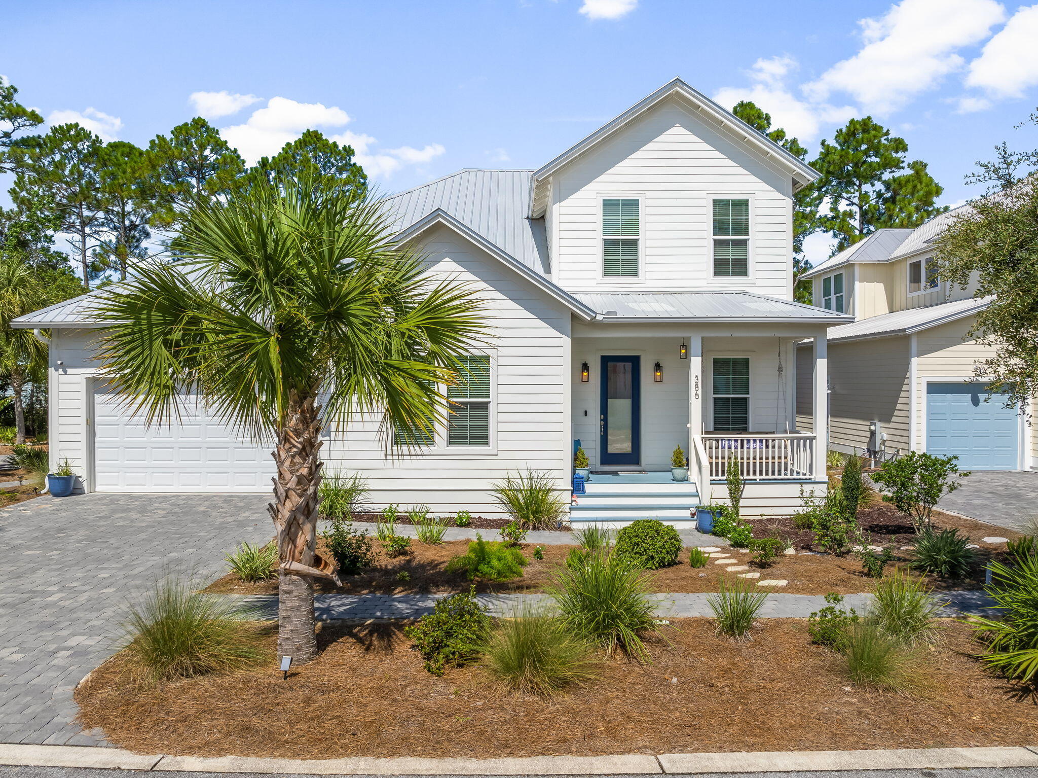 Welcome to 386 Marlberry Trace, a beautifully crafted Florida Cottage-style home located in the gated community of Hidden Grove in Santa Rosa Beach. Built in 2022 and offering over 2,500 square feet, this spacious 4-bedroom, 3.5-bath home features a thoughtfully designed floorplan with abundant storage throughout. The main living area showcases soaring vaulted ceilings, creating a bright and open feel, while 10-foot ceilings continue throughout the rest of the main level. The stunning kitchen is a true focal point, featuring an oversized island perfect for gathering and entertaining, ample cabinetry, a wine fridge, and modern finishes that blend style and function. Durable luxury vinyl plank flooring and tile in the bathrooms offer both elegance and practicality. The primary suite is conveniently located on the first floor and includes a large walk-in closet, with additional storage options thoughtfully placed throughout the home. You'll also enjoy the oversized two-car garage, which offers even more room for storage, beach gear, or a small workshop. Step outside to a screened in back porch and private yard ideal for relaxing or hosting guests. Hidden Grove offers a community pool and gated access for added comfort and security. Just minutes from the bay and the beach, and close to great shopping, dining, and entertainment, this home offers the best of coastal living in one of Santa Rosa Beach's most desirable neighborhoods.