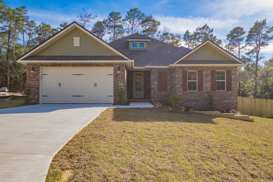 BRAND NEW HOME on LARGE WOODED LOT! This home features 4 bedrooms with 3 bathrooms including separate bedroom upstairs with bath. The standard features are combination BRICK with fiber cement siding, bluetooth enabled garage door opener, custom MUDROOM with bench seats, cubbies, and hanging hooks, GRANITE in Kitchen, Baths, and Laundry Room, Tile Backsplash in Kitchen, Custom Tile Shower, STAINLESS STEEL appliance package, HARDWOOD FLOORS all on an almost acre lot! In addition, there is crown molding and upscale fixtures. It is a MUST SEE!!