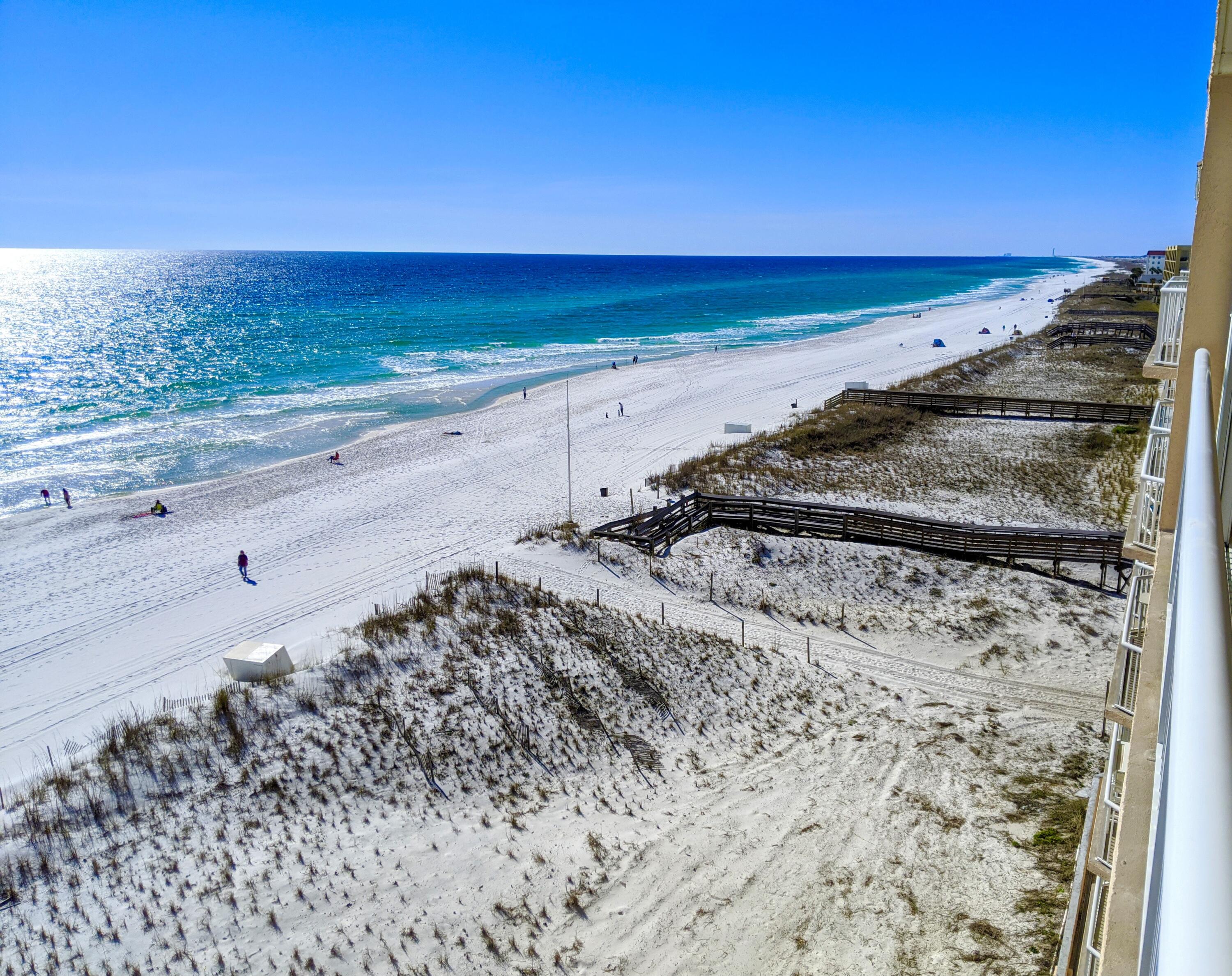 ISLAND ECHOS **Unit 6E This is a beautiful, updated unit in popular Island Echos. Gulf front with spectacular views of the Gulf of Mexico. Located on the beach on Okaloosa Island. Master bedroom has two queen sized beds; second bedroom has one queen sized bed. There's also a queen sized pull out sofa in the living room. Sleeps 8. Modern decor with a breakfast bar. LVF Wood looking floors throughout. Amenities include: Gulf front pool (seasonally heated) and shuffleboard, lighted tennis/pickleball court, exercise room, party room, plenty of parking. Gated community. Great rental or perfect for a second home.Buyer to verify all property data~
