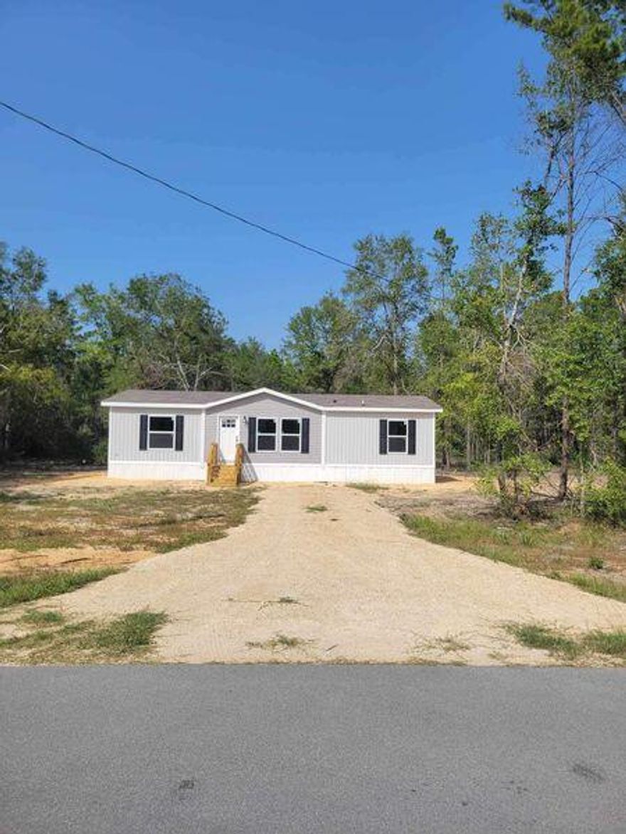 Beautiful Home located on ONE FULL ACRE!
Home is Brand NEW! Greys and White colors are so relaxing, with an OPEN concept Living Room, Dining Room and Kitchen. All Stainless Steel appliances.  Two FULL baths and three bedrooms. Master has a walk in closet.