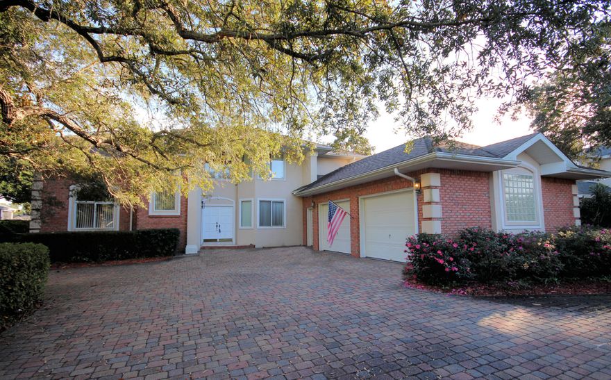 Waterfront home on Grass Lake Bayou in the gated community of Southwind of Bluewater Bay. Relax and enjoy the sunsets or watch the dolphins, pelicans and ospreys fish and play in the bayou. Fish from the end of your dock or take your boat out on the bay for the day. This custom built one owner home needs some updating but it has ''good bones'' and a very livable floorplan. When you enter through the wide foyer, the view through the large living room will capture your attention. The dining room is open to the living room and beyond that is the Florida room with a built in hot tub! The master bedroom is downstairs as well as an office that could also be the 4th bedroom. A loft, 2 bedrooms and another full bath are upstairs. There is an oversized 3-car garage and a circular paver drivew