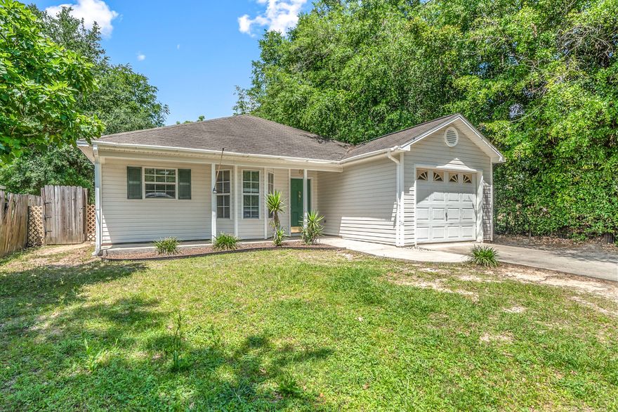 Adorable, affordable home in central Crestview on FLAT lot with big backyard! *New roof to be installed prior to closing with acceptable offer!* NEW luxury vinyl plank flooring in living, kitchen, and baths! Move-in ready! HVAC 2012. Roomy kitchen with eat-in dining area. Vaulted ceilings in living. Fully fenced backyard with deck.Measurements are approx., buyer to verify all pertinent details