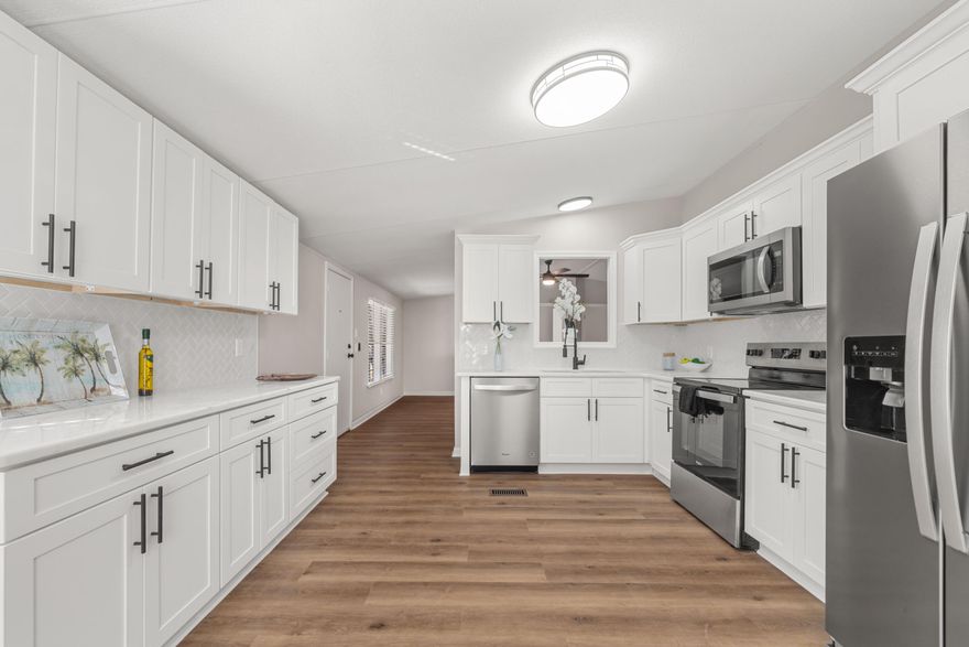 BACK ON MARKET AT NO FAULT OF SELLER. 100% Fully Renovated Home on 3 Acres in leisure lakes!! Lake access and boat launch in gated community. Updates! New Kitchen and baths with Granite counter-tops and new Stainless-Steel appliances in kitchen, new paint in and out, new flooring, new fans and lights, New AC and Hot Water Heater, Existing Metal roof updated with new paint and screws, New 2025 4 Pt/Wind Mit being done.  Location, Location, Location! This 3-acre gem is nestled in the sought-after Leisure Lakes community with fantastic amenities: Boat Launch & Lake Access: Perfect for water enthusiasts. Community Pool: Relax and unwind with neighbors. Gated Community: Added security and peace of mind. Property Details: 3 bedrooms, 2 bathrooms with 1,080 square feet of living space.