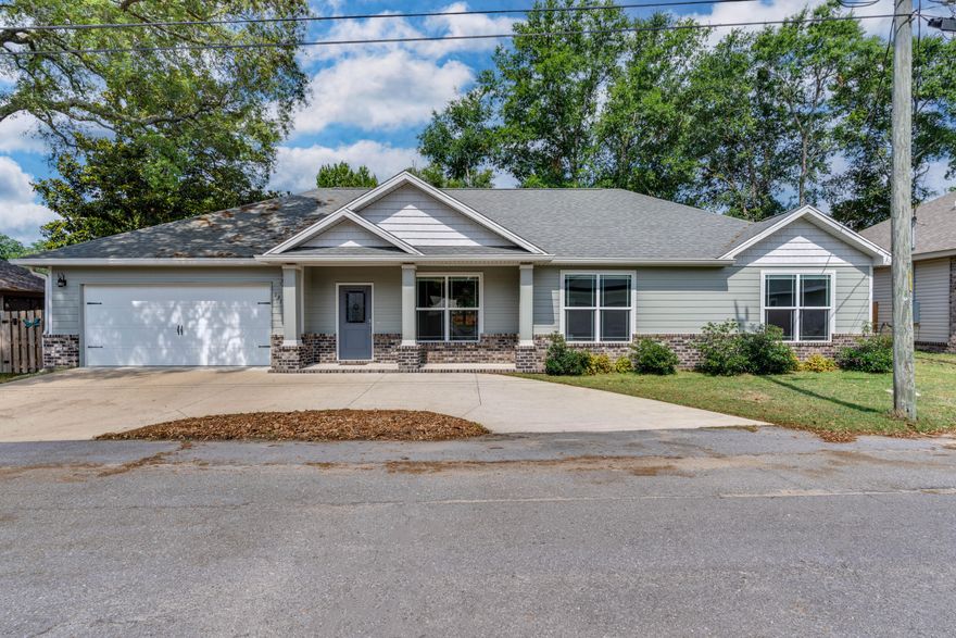 Built in 2020, this is a craftsman style, single story custom home with 4 bedrooms/2 baths in the heart of Niceville! Privacy fenced back yard is perfect for letting out for pets. This is a low maintenance lot within walking distance of Lions park and the Wharf 850, which is great for swimming, fishing, boating and dining! This home has Hardy Plank siding and luxury vinyl plank flooring with carpet in the bedrooms. Additionally, this home has granite counter tops and a large laundry room, making it PERFECT for a military family with kids! EXCELLENT location, schools, and street! This is one you don't want to miss! Sellers will consider a VA mortgage assumption!