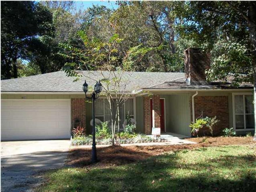 WATER VIEW HOME across from the Rocky Bayou. Enjoy endless days and nights on your covered front porch. Beautiful all brick home on a quiet, tucked away street. As you enter through the red stained glass door, your eyes will follow the open floor plan and notice the workmanship incorporated in this bright and well maintained home. Ceramic tile floors flow through the living room, formal dining room, breakfast nook, and kitchen. There is a corner brick fireplace and solid hardwood ceiling beams in the living room. The breakfast bar area is accented by an interior brick wall and brick column. Enjoy the spacious kitchen with stainless steel appliances. There are plenty of cabinets and tiled countertops for your cooking comfort. French doors lead out to your covered patio with new pavers and