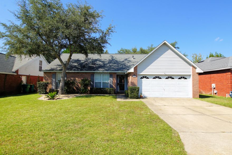 A Beautiful 5 bedroom home in Desirable Bluewater Bay! A spacious open family room with vaulted ceilings and gas fireplace welcome you home. This airy room over looks an inviting screened-in back porch and large fenced-in yard with pavers, lots of room for entertaining! The kitchen has abundant space for a table and an island for additional preparation space. A separate laundry room right off the kitchen is an added convenience. On the main floor is a master bedroom with two additional bedrooms across the hall. Upstairs is a loft for an office, art space or exercise area and two additional bedrooms bookend the loft and a bathroom.
