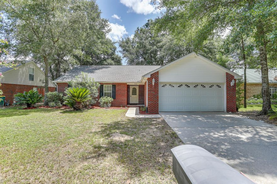 Come enjoy this well maintained 4 bedroom/2bath/2 car garage home nestled in the sought after subdivision of Pinnacle Point located South of I-10.  The home welcomes family and friends alike with cathedral ceilings in the family room accented with a fireplace and has access to the large Florida Room perfect for entertaining.  The kitchen features white cabinets, attractive granite counters and undermount sink, and large pantry.  The master suite features a walk in closet, dual vanities, new vinyl plank flooring in master bath.  The home features a split bedroom design and the additional bedrooms are nice sized and have ample closet space.  The roof and water heater were replaced in 2021 and the HVAC was replaced Sept 2017. Schedule your private showing today!