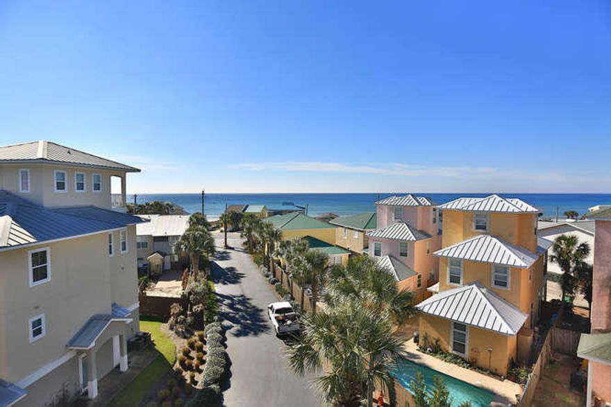 In the Utmost Quiet part of PCB & only 3.5 Miles to Rosemary Beach.This Townhome Boasts the Best Gulf Views in the Complex Just steps to the Beach Walkover. Add to that your Private Elevator takes you to the 3rd floor so forget about stairs. Each Bedroom has it's own Bathroom & So Many Balconies! Granite and Stainless in the Spacious kitchen makes this a Lovely 2nd Home or a Profitable Rental. Seller is offering a floor allowance to remove the carpet