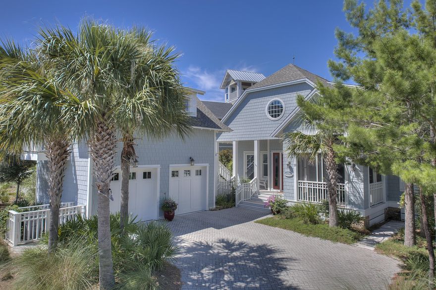 Find outstanding value in this bright and airy Nantucket-style WaterSound Beach residence with a three bedroom main home and separate guest cottage over a two car garage. Designed to comfortably accommodate everyone, the master suite is located on the main floor while the second story includes two spacious guest rooms with ensuite bathrooms and an additional living area. Beautiful windows and transoms fill this home with abundant natural light, and two screened porches extend the living space and allow for the enjoyment of afternoon gulf breezes. Camp Creek Lake is a short -1/2 block stroll away for fishing, launching kayaks or paddleboards or just enjoying another spectacular WaterSound Beach sunset from the dock. The beautiful Bridges community pool is nearby as well as boardwalk access