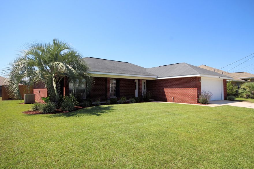 IMMACULATE and Well Maintained All Brick Home in Hampton Ridge Estates. So close to Shopping, Dining and Florida's Best Kept Secret- Navarre Beach! Walk or Ride your Bike to Navarre High Football Games, NYSA Ball Fields and the Walking Path! YMCA is a few blocks away! Convenient to Hurlburt Field or Pensacola NAS. You Should Love Where You Live and You Will Love Living Here. Kitchen boasts Granite Counters and is Open to Dining Area. Master Suite located off the Kitchen with 3 Additional Rooms on the Other Side of the Home. Gorgeous Covered Front Porch awaits your Outdoor Furniture. Fenced Backyard is Lush and Beautiful. 2 Car Garage has a New Epoxy Floor and Leads Inside to the Laundry Room. Put This at the TOP of your List. You'll Be Glad You Did!Buyer to verify all measure