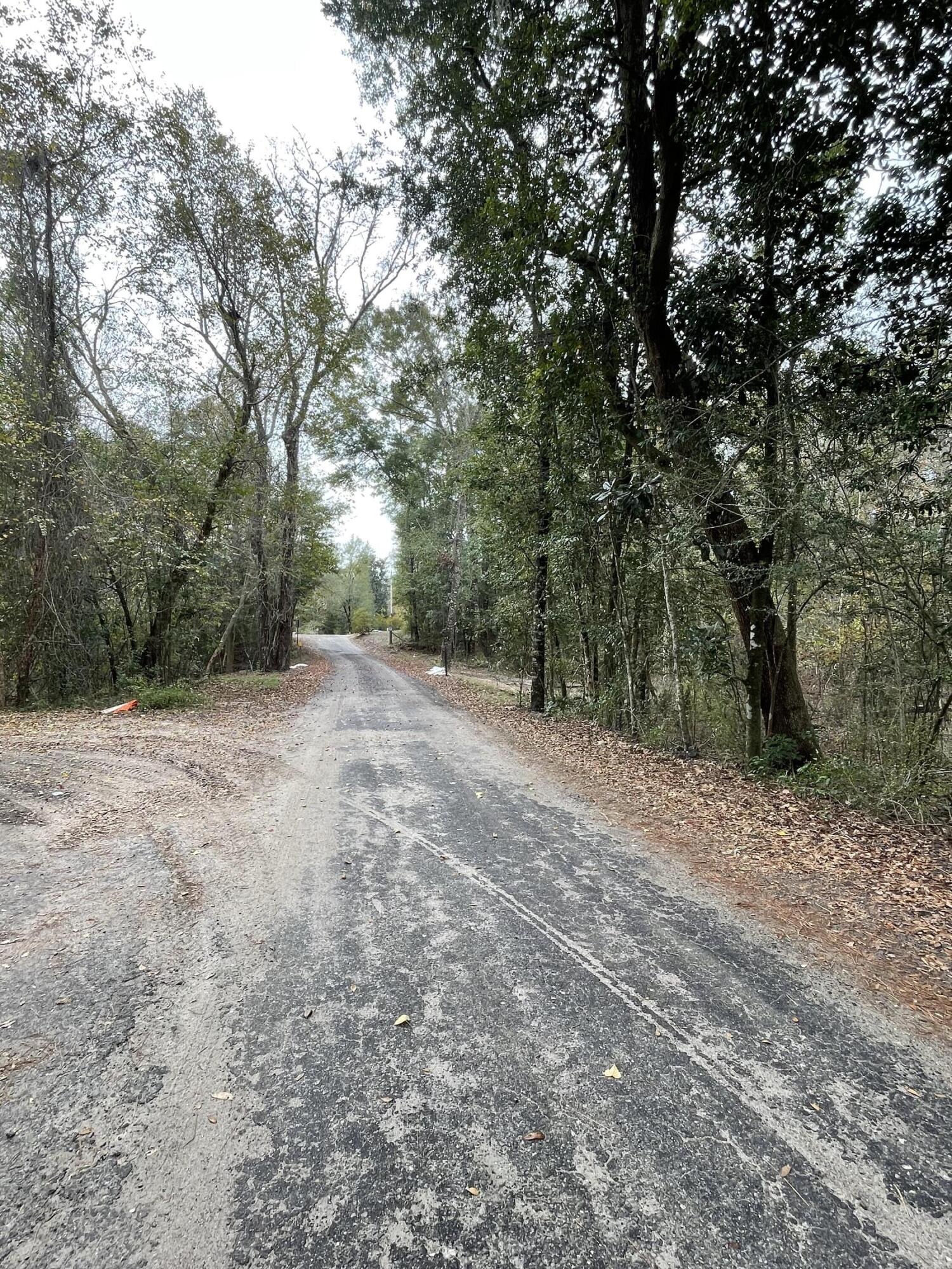 Vacant residential Lot in unrestricted residential neighborhood. No HOA. Older delapitated home on site.