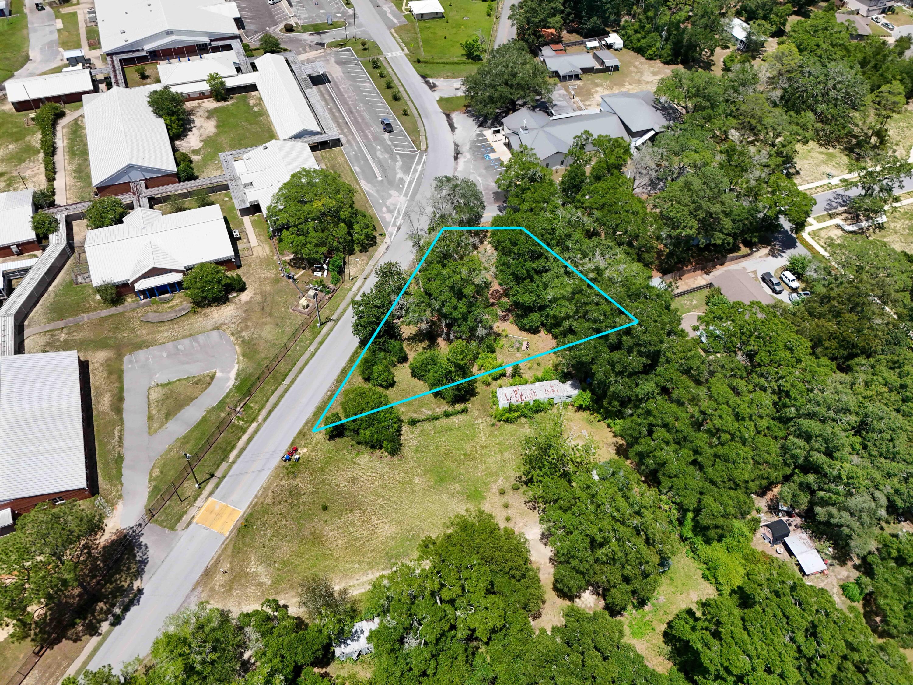 Prime Commercial opportunity awaits in Freeport, FL, on this highly visible corner 0.43 acre parcel; Zoned General Commercial. Strategically located in the heart of the city, across from the old Freeport Middle School. This property offers unparalleled exposure for your business, making it an ideal spot for a variety of commercial ventures. The 0.43 acre lot provides ample space for development, whether it's a retail store, restaurant, office building, or service center. Take advantage of the growing demand in Freeport's commercial market and capitalize on the potential of this prime property. With its convenient location, high visibility, and versatile opportunity, this property is poised for success.Don't miss this exceptional opportunity; call us today!