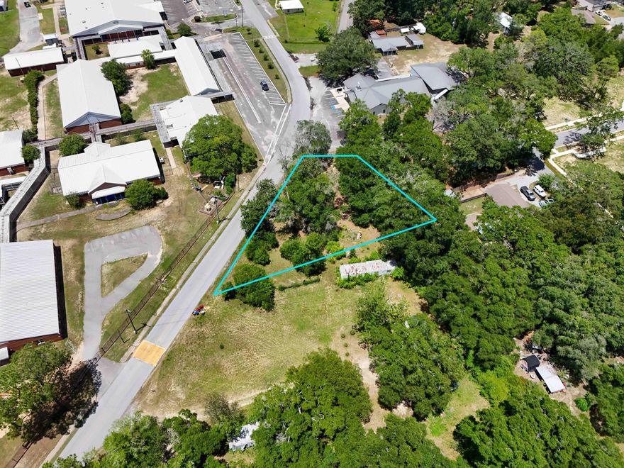 Prime Commercial opportunity awaits in Freeport, FL, on this highly visible corner 0.43 acre parcel; Zoned General Commercial. Strategically located in the heart of the city, across from the old Freeport Middle School. This property offers unparalleled exposure for your business, making it an ideal spot for a variety of commercial ventures. The 0.43 acre lot provides ample space for development, whether it's a retail store, restaurant, office building, or service center. Take advantage of the growing demand in Freeport's commercial market and capitalize on the potential of this prime property. With its convenient location, high visibility, and versatile opportunity, this property is poised for success.Don't miss this exceptional opportunity; call us today!