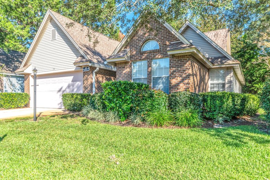 Fantastic home in the center of Bluewater Bay, just a short jaunt to the Golf Course, Club House, Tennis Courts and community pools. Sidewalks abound, golf carts welcome and ample community events to keep you busy! This home features a split floor plan with two bedrooms towards the front of the home with a shared bathroom. The kitchen overlooks the large living room and is well lite with wonderful natural lighting. The home is painted a neutral creamy white - perfect for any style furniture or decor. Off the living room is a wonderful screened-in porch which is excellent for enjoying a cup of tea/coffee. The kitchen has ample cabinet space and plenty of room for a breakfast table. In the rear of the home is the master bedroom and large en suite bathroom with separate walk-in shower