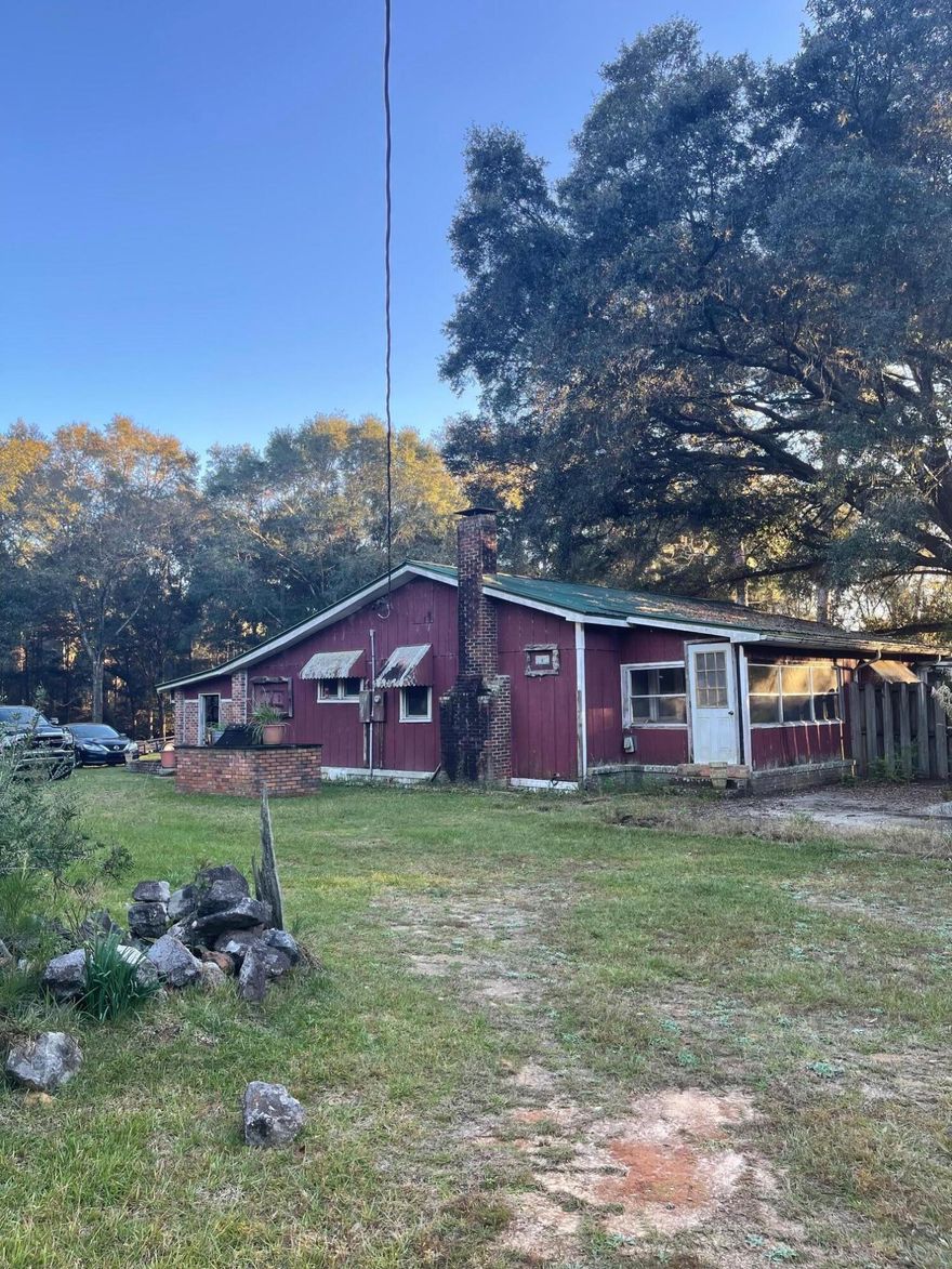 This 3 bedroom 2 bath home is located on 4.9 acres! If you have been thinking about peace and quiet, this is the one for you! Plenty of room  to start your own mini farm. This property is located about 20 minutes from DeFuniak Springs. Cash or Conventional loans only. Come take a look before its gone! Buyer to verify all measurements.