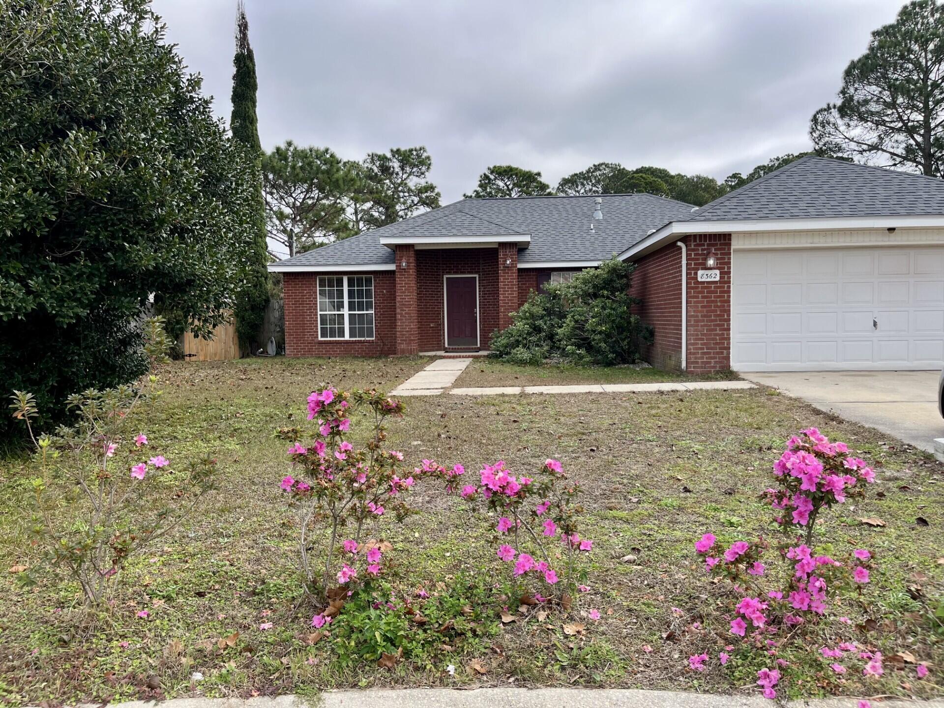 HUGE OVERSIZED LOT at the end of a cul-de-sac!!!!! Perfect 4 bedroom, 2 bathroom family home on 3/4 of an acre lot that includes a beautiful backyard for enjoying our Emerald Coast weather. Pets are welcome with a nonrefundable pet fee. Call the office for more information 850-936-0700, or come by Navarre Beach Realty in the Winn Dixie Shopping Center. 8666 Navarre Parkway. Office hours are Monday - Friday 9am-5pm. You can check out keys to view the property. Keys must be returned by 5pm.