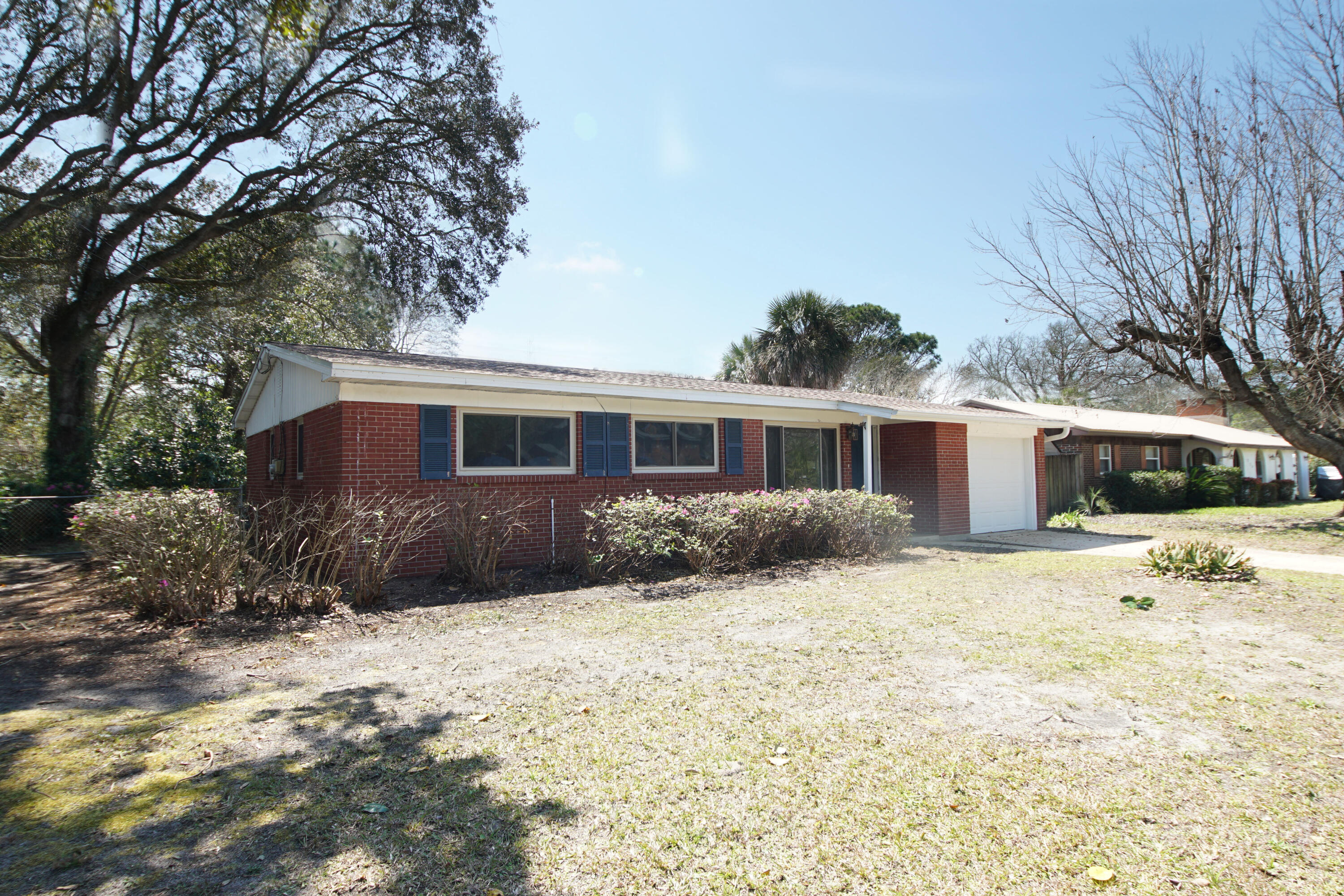 Bring your HGTV ideas for some cosmetic updates and you'll have the perfect place to call home! All brick, spacious fenced yard wtih lemon tree (in bloom now for next winter's yield), kumquats (full of fruit now), pineapple, banana, herbs and more. Interior features 3 bedrooms, 2 full baths, inside laundry (washer/dryer included), updated cabinets, and Stainless Steel appliances. Big ticket items have been updated to include garage door (2021), Guest bath (tub plumbing and tile (2020), sprinkler pump wiring and rain timer (2019), roof (2018), gas HWH (2017), HVAC (2016--10 yr warranty through 4-26), windows wtih huricane coverings (2013), kitchen cabinets (2010). In addition, Sellers are offering an Old Republic home warranty (Essential Plan) for Buyers' peace of mind (see documents)