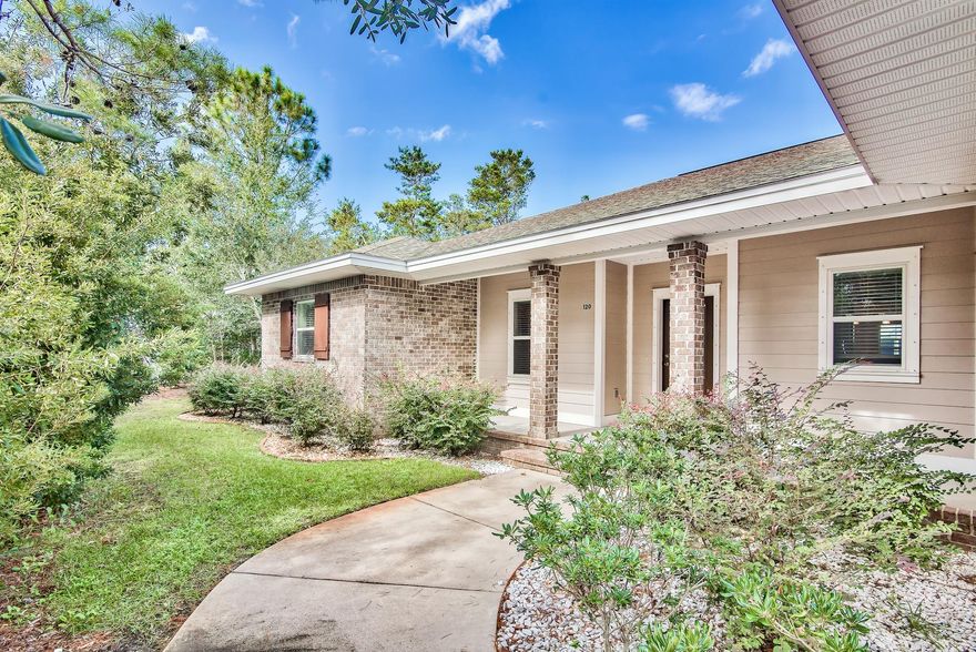 Phenomenal opportunity to own an exceptional property on a private cul-de-sac 0.67 acre lot in the gated community of Pelican Bay, just steps to the Bay yet still close to the beautiful beaches of South Walton. This property offers not one, but three structures! A one level main home featuring beautiful hardwood flooring throughout with 3 bedrooms & 2 baths plus a 2-car garage. The 1 bedroom, 1 bath guest home features a full size living room & kitchen. There is an additional detached 2-car garage that has been converted into an amazing entertainment space with a bar, half bath, and 3 TV's. It's the perfect spot to watch the game! There's an expansive, partially fenced, backyard with Bay views & a fantastic screened-in back porch. Unwind on the porch swing & take in the serene environment!