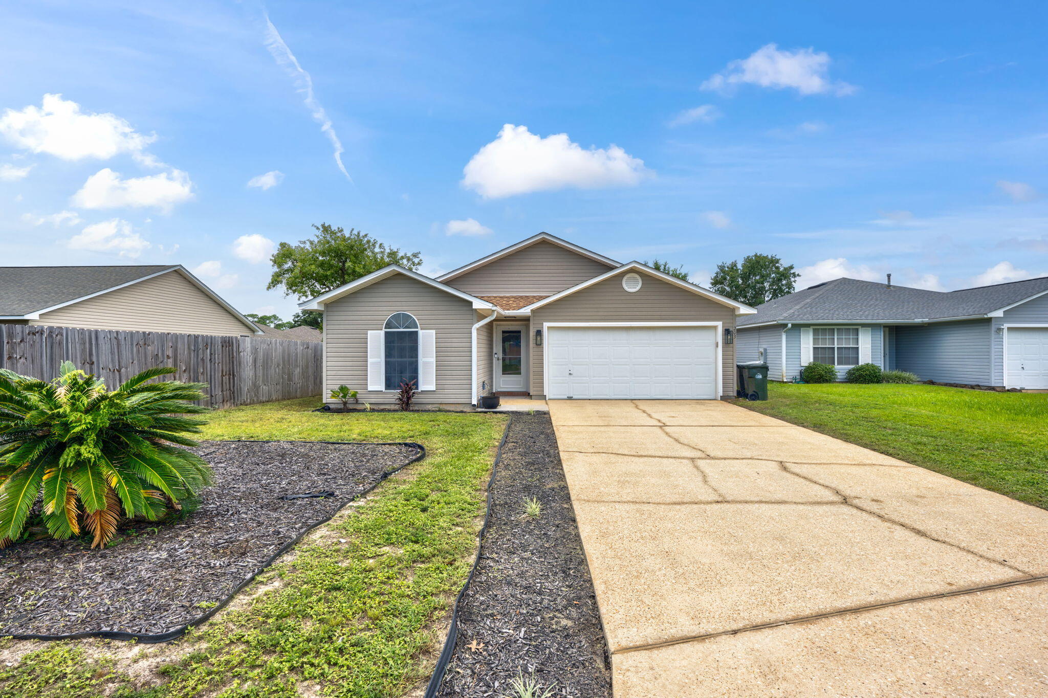 This beautifully maintained 3-bedroom, 2-full bathroom residence is equipped with all the upgrades a home owner desires!  This property features a new roof and HVAC system, both replaced in 2020, as well as a new water heater, providing peace of mind to the new owner. The kitchen opens to a cozy dining area, perfect for being utilized as a formal dining room or a casual sitting area. The bedroom layout is a split floorplan, leaving the Primary to a separate wing of the house for ample privacy. The Primary Suite is a serene retreat with a spacious feel, extra large windows, a walk-in closet, and a Primary en-suite bathroom! The two additional bedrooms provide plenty of space for family, guests, or a home office. Outside, the spacious backyard is ideal for outdoor activities, gardening, or