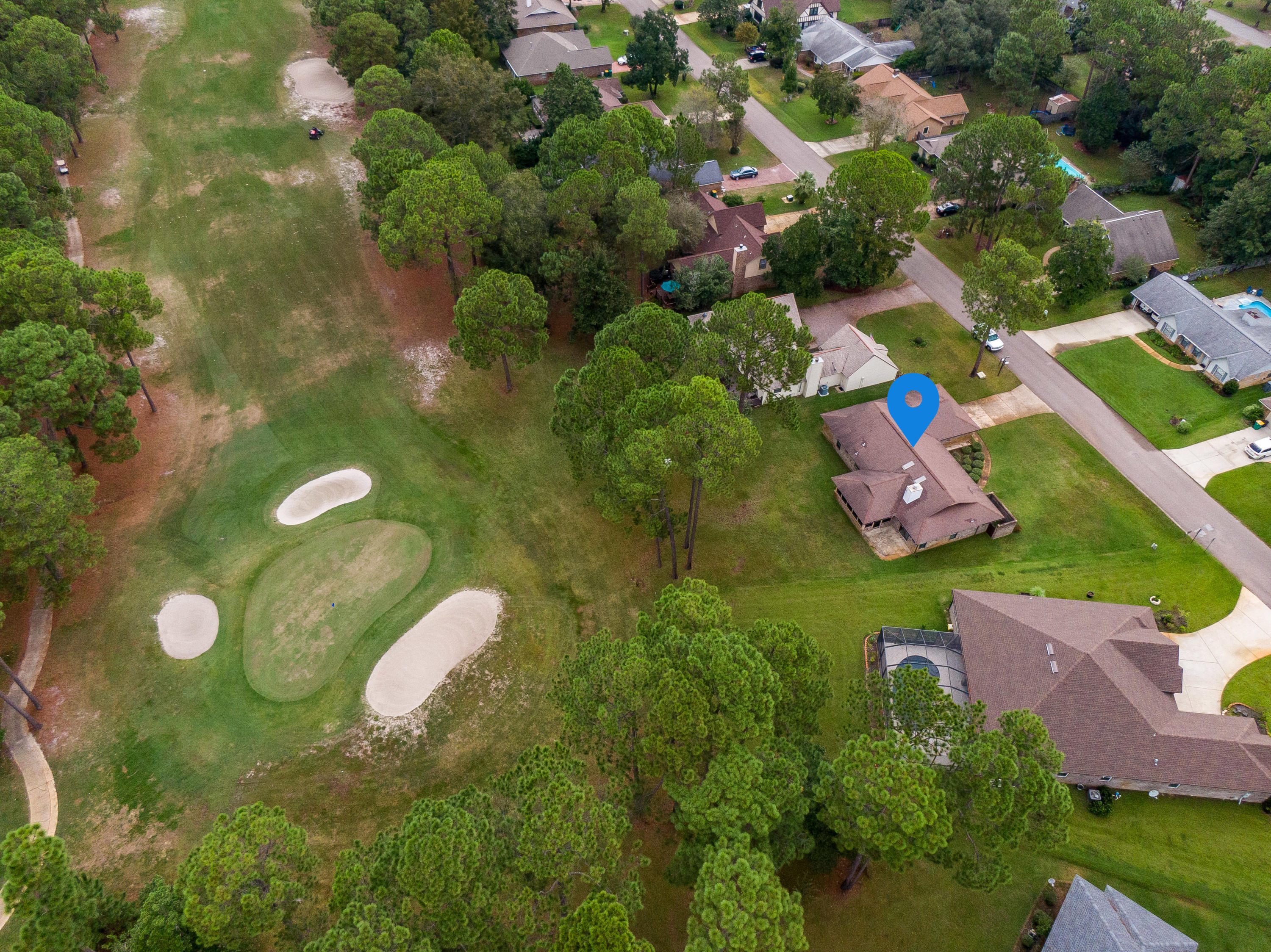 You will not want to miss out on this one story Bluewater Bay golf course home. This house is located in St. Andrews Village and very close to restaurants, grocery store, shopping, medical and other important amenities. 1164 Troon Drive West is a one story, 3-bedroom brick home with lots of character and tons of potential to make it your own. Enjoy a natural brick fire place and an open covered porch that looks out to the golf course. The home has plenty of space for entertaining with an open dining area, living room and family room. This home is in an excellent neighborhood and Niceville/Bluewater Bay is a wonderful place to raise a family, retire or treat as a second home to escape a different location. These homes are also excellent rental investments with the constant flow of military