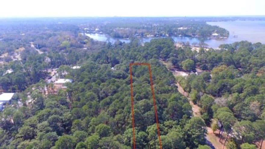 GREAT BUILDING LOT IN BOATING NEIGHBORHOOD! Two neighborhood Boat Launches into Choctawhatchee Bay give this 1.35 acre lot potential for being a great building lot with plenty of space for boats and other recreational vehicles. This deep wooded lot has a 30' deeded easement at the rear of the lot for ingress and egress for pedestrian and vehicles. Located in South Walton County east of Sandestin and west of Scenic 30A. Shopping and Dining at Grand Blvd. west of this lot and 30A and Beaches of South Walton east of the lot. Great location with water all around, Hewett Bayou, canals and the Bay.