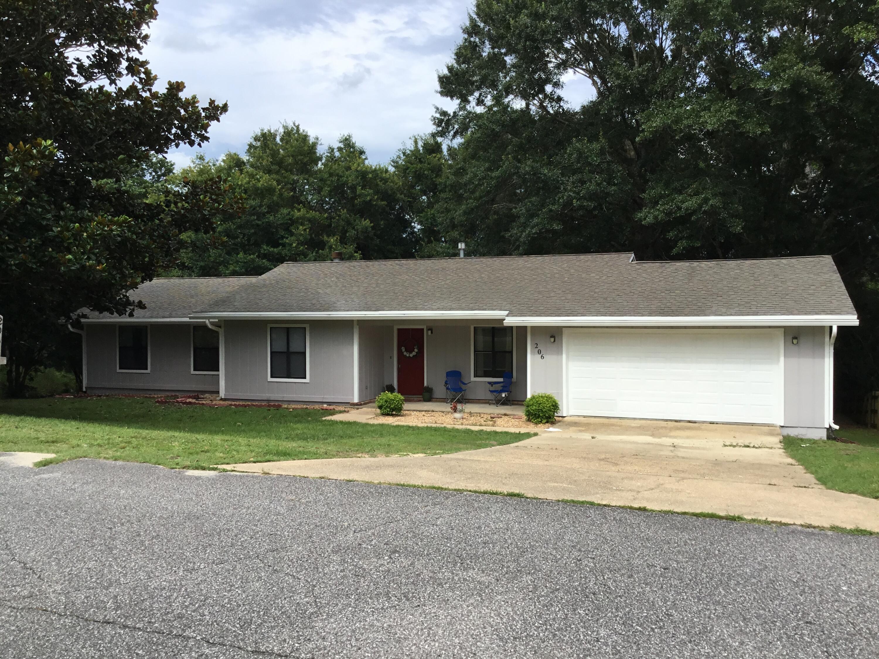 This three bedroom two bath house is located in South Crestview and is accessible to the interstate, stores and schools. Beautiful hardwood floors in the main living areas with tile in the kitchen and bathrooms as well as carpet in the hallway and bedrooms. New refrigerator with new dishwasher and stove to be installed as well. The home has been freshly painted inside as well as the exterior. Buyer to verify all information deemed important.