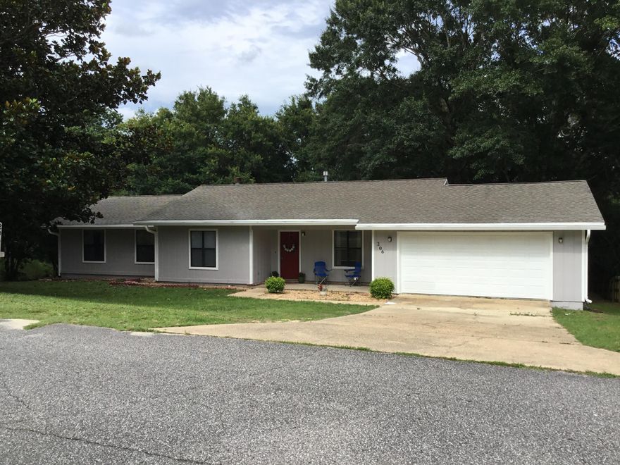 This three bedroom two bath house is located in South Crestview and is accessible to the interstate, stores and schools.  Beautiful hardwood floors in the main living areas with tile in the kitchen and bathrooms as well as carpet in the hallway and bedrooms.  New refrigerator with new dishwasher and stove to be installed as well.  The home has been freshly painted inside as well as the exterior.  Buyer to verify all information deemed important.